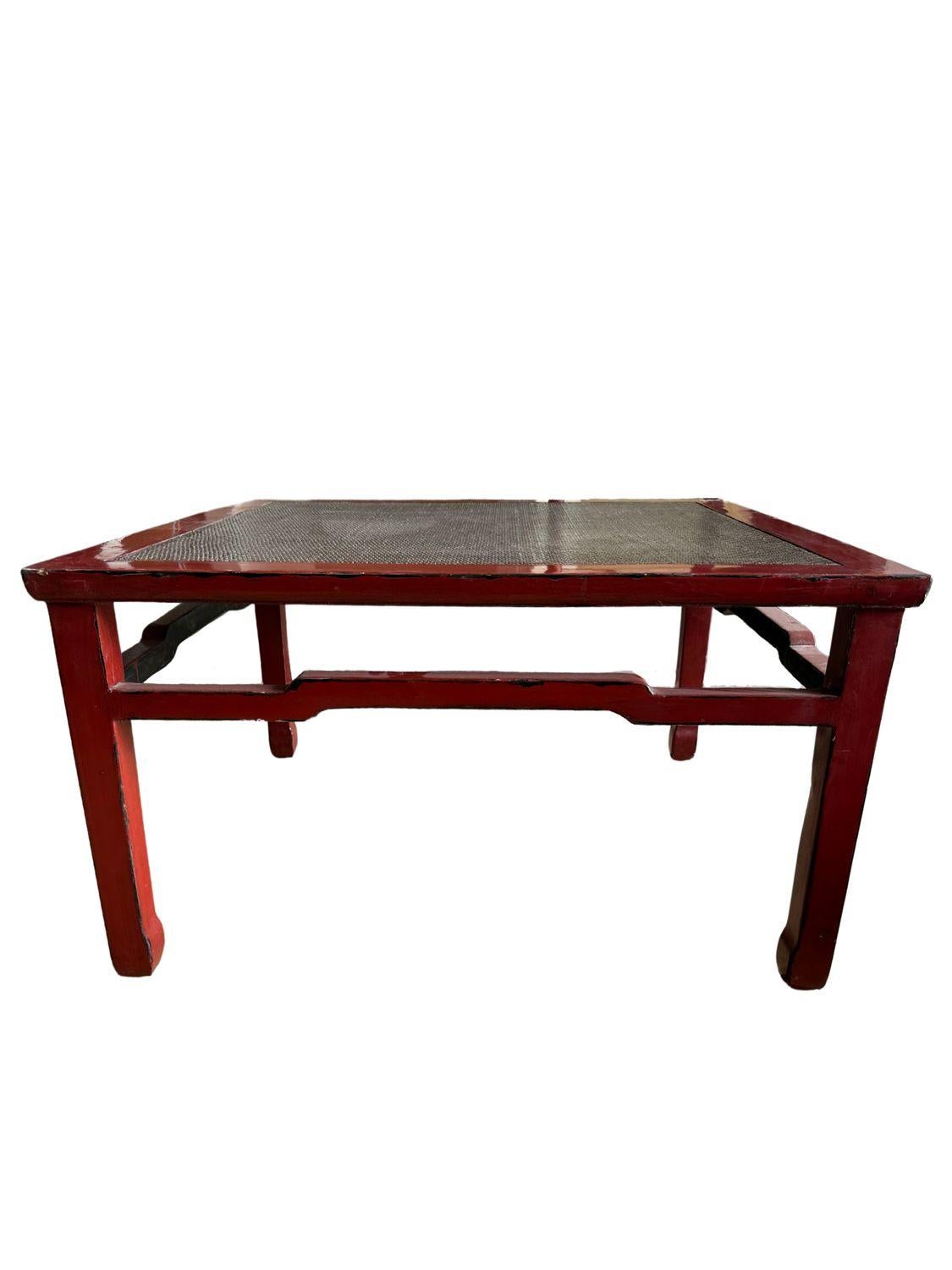 Asian Red Elm Wood Coffee Table with Intricate Rattan Center For Sale