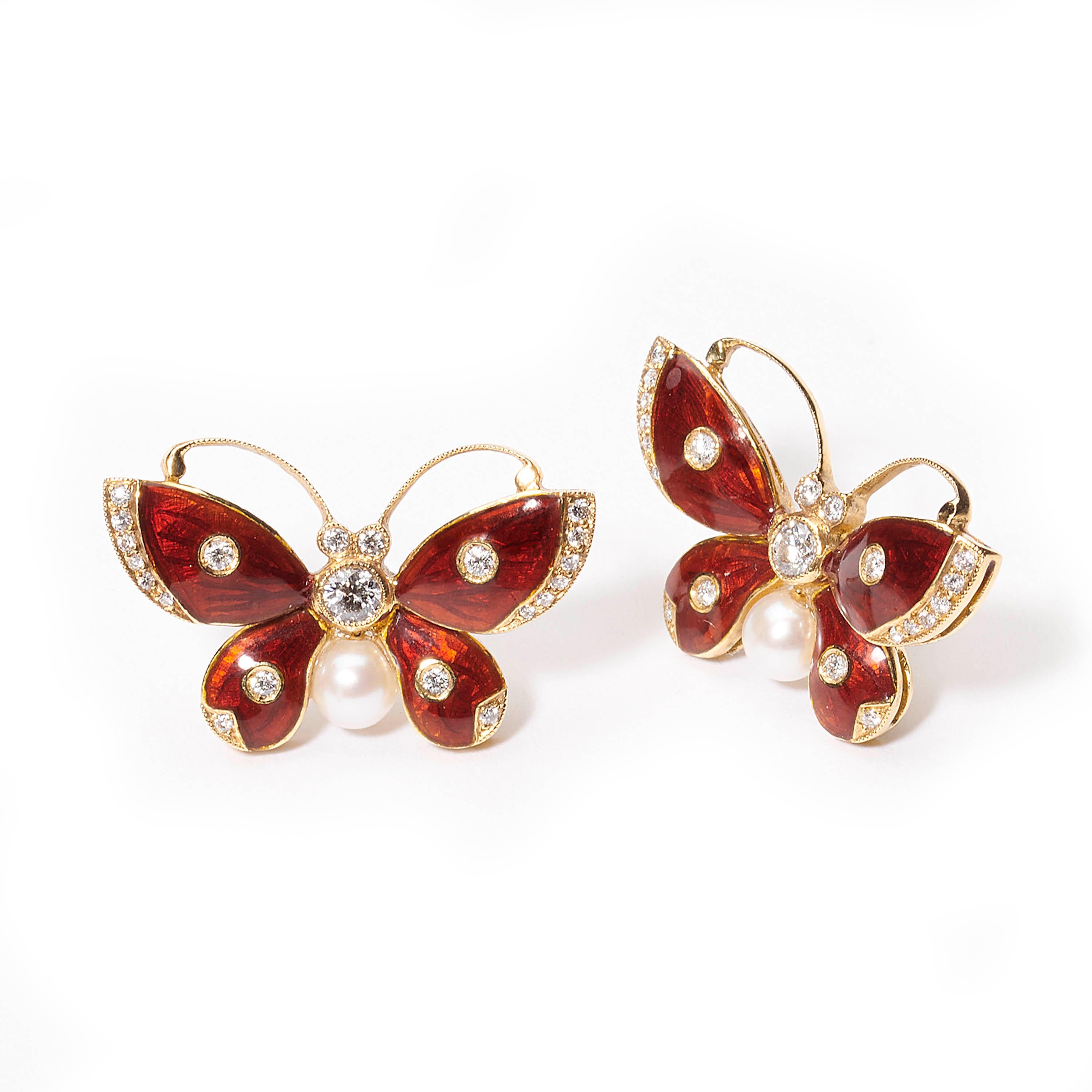 A pair of modern, red guilloche enamel butterfly earrings set with 0.50ct of round brilliant-cut diamonds with a pearl in each, mounted in yellow gold, with posts and butterfly fittings.