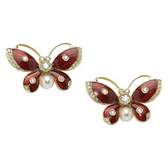 Boucles d'oreilles papillon en émail rouge et diamants