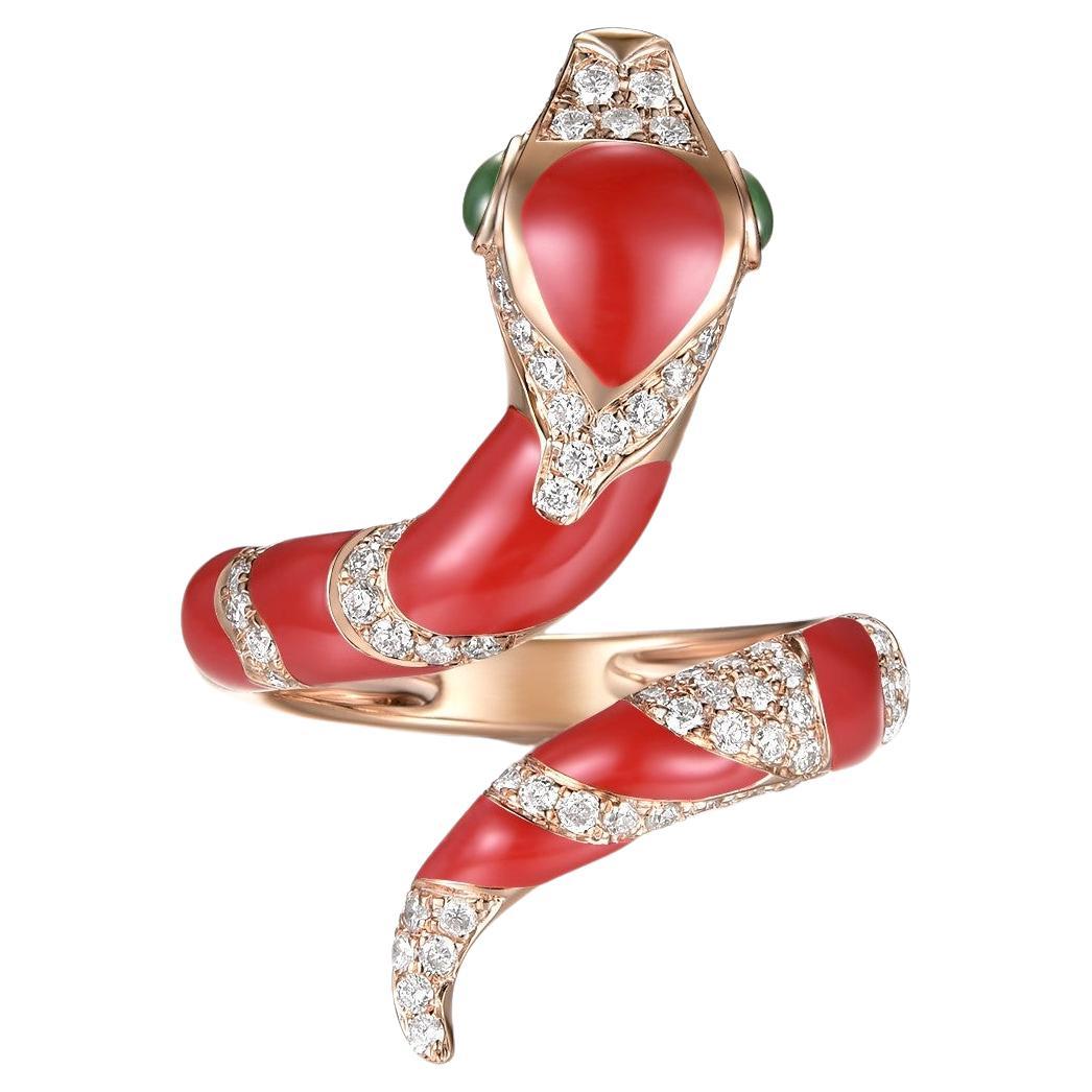 This stunning snake ring features 0.55 carat of white round diamonds, the body is covered with red enamel. The eyes of the ring is set with green jade. The snake can be customized in any color or stones. Feel free to contact me for inquiry. More
