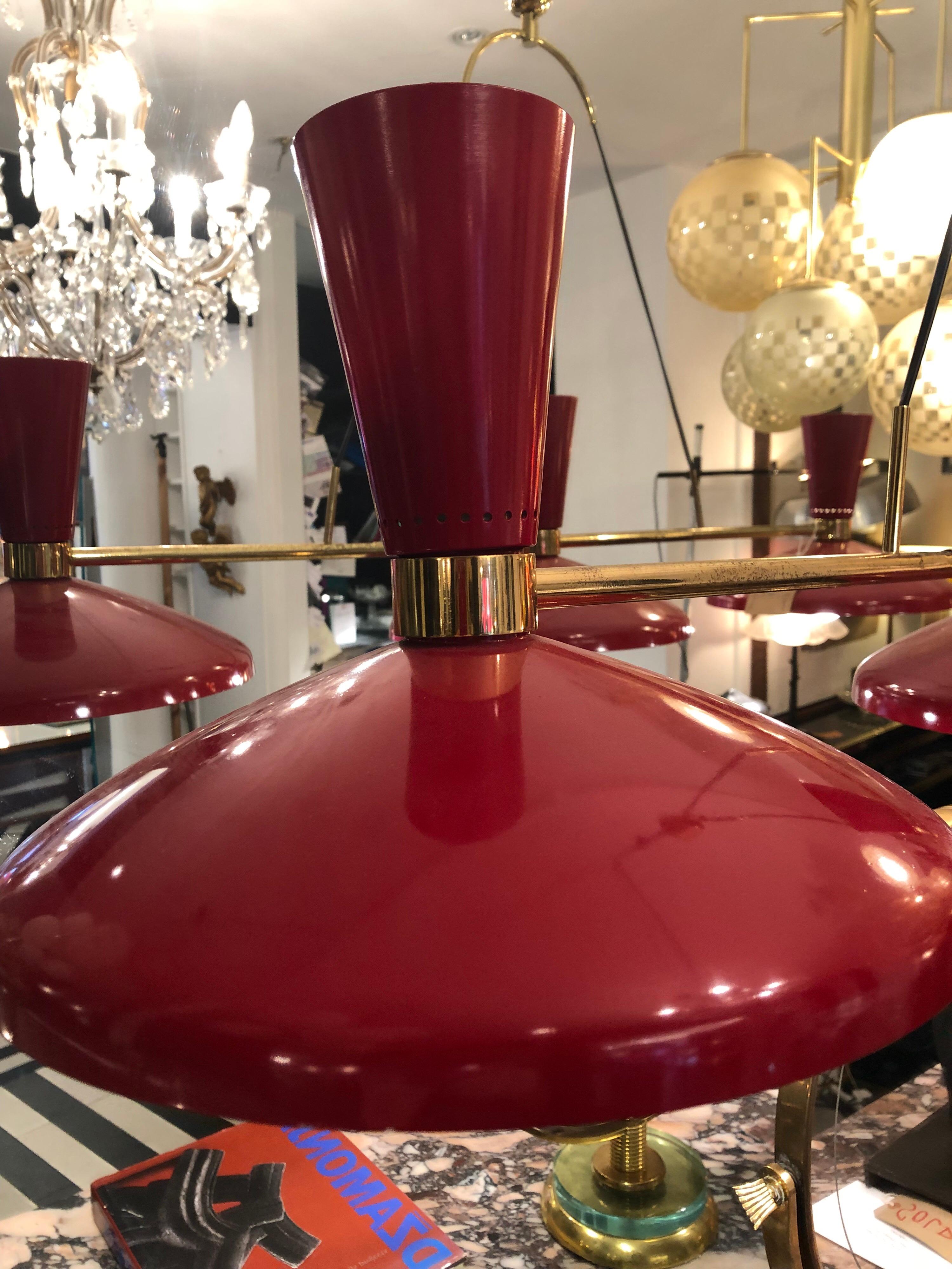 A very rare red enamelled and brass rectangular ceiling light by Stilnovo.