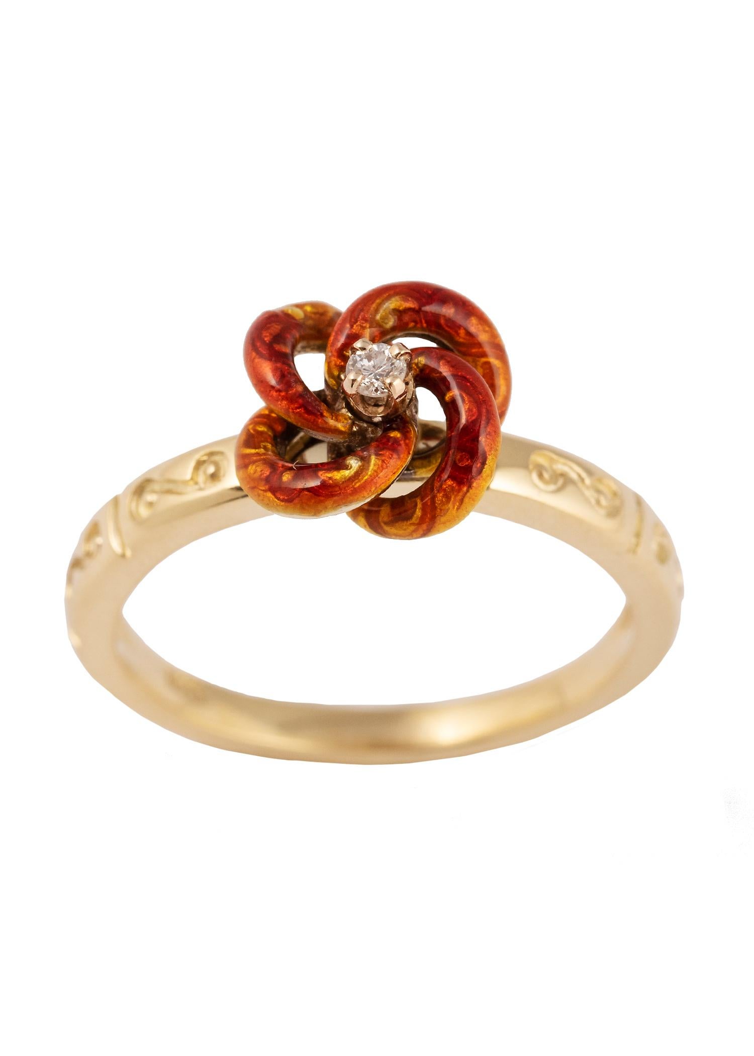 A 19th century translucent red and yellow enamel knot on a repoussé ground, set with a bright diamond, mounted on an 18k gold ring, the shank decorated with swirl motifs. 

Knot 3/8 in. (1 cm) diam; ¼ in. (.6 cm) high.

Size 7 ½. 
