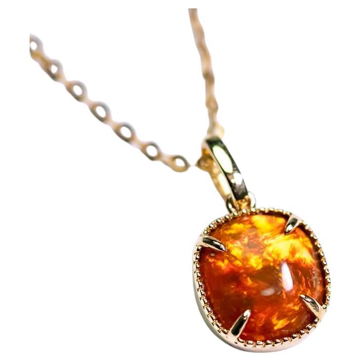 Collier d
opale éthiopienne rouge en or jaune 14k