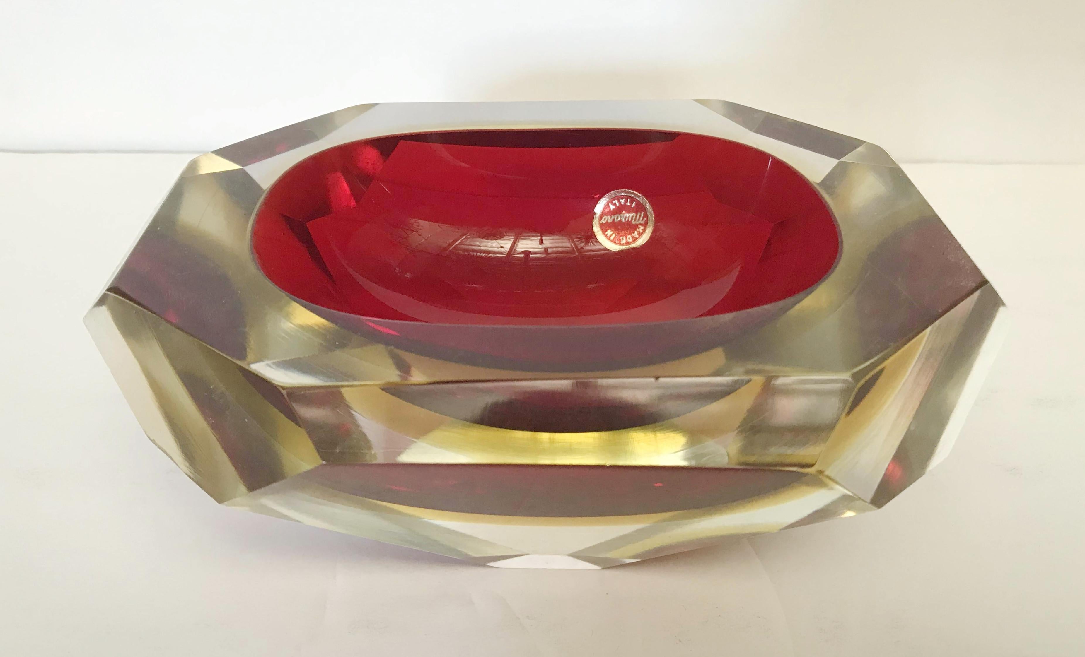 Vintage Italian red faceted Murano glass bowl blown in Sommerso technique / Designed by Mandruzzato circa 1960s / Made in Italy
Original sticker on the bowl
Measures: Length 7 inches, width 5.5 inches, height 3 inches
1 in stock in Palm Springs
