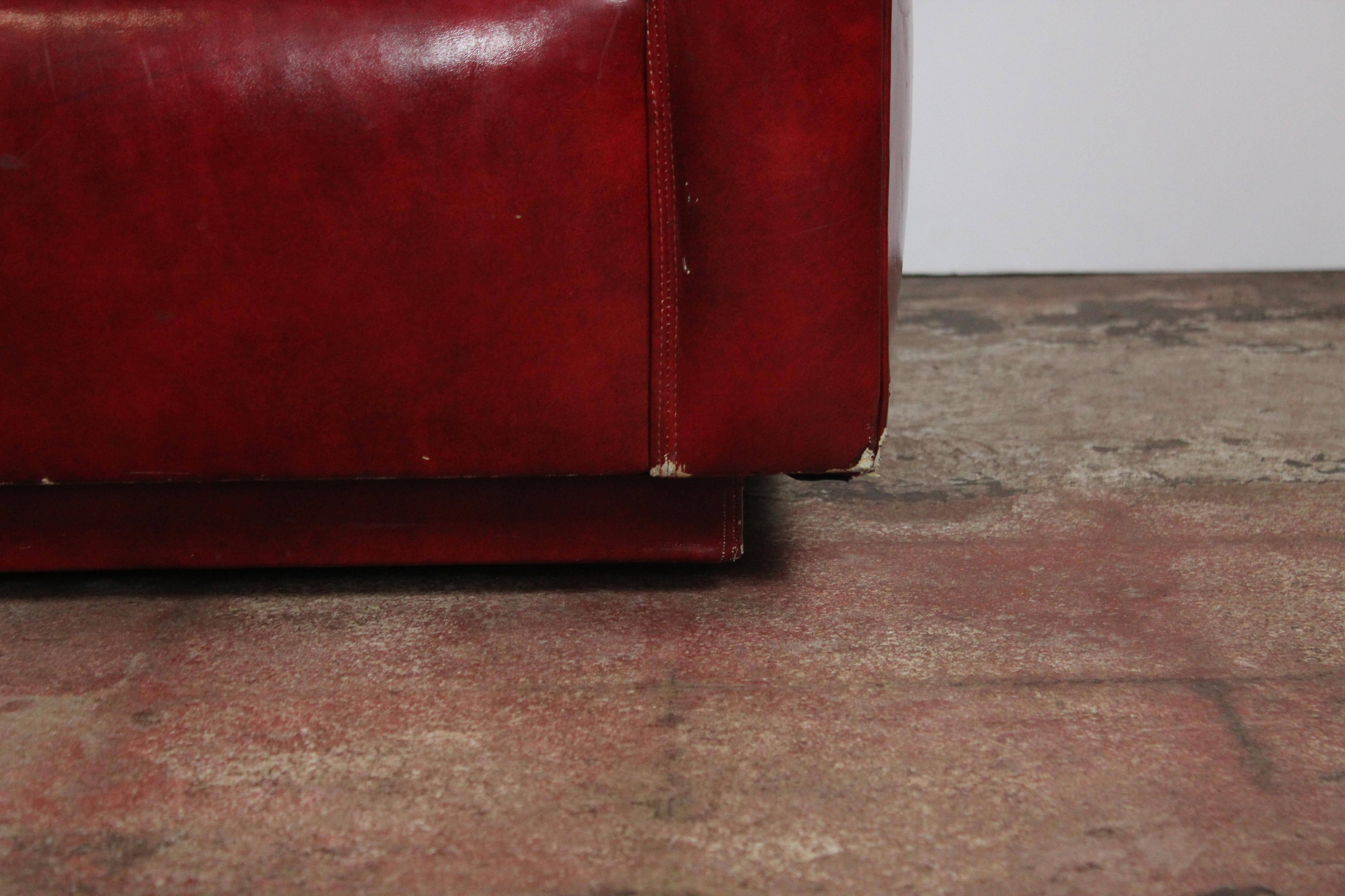 red leather love seat