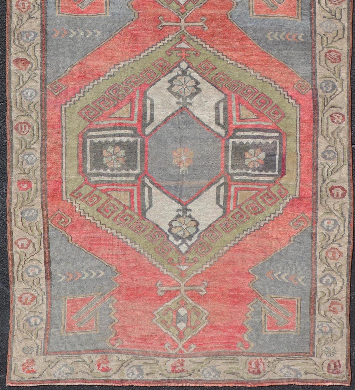 Red Field Vintage Turkish Oushak Gallery Runner with A Geometric Design In Good Condition For Sale In Atlanta, GA