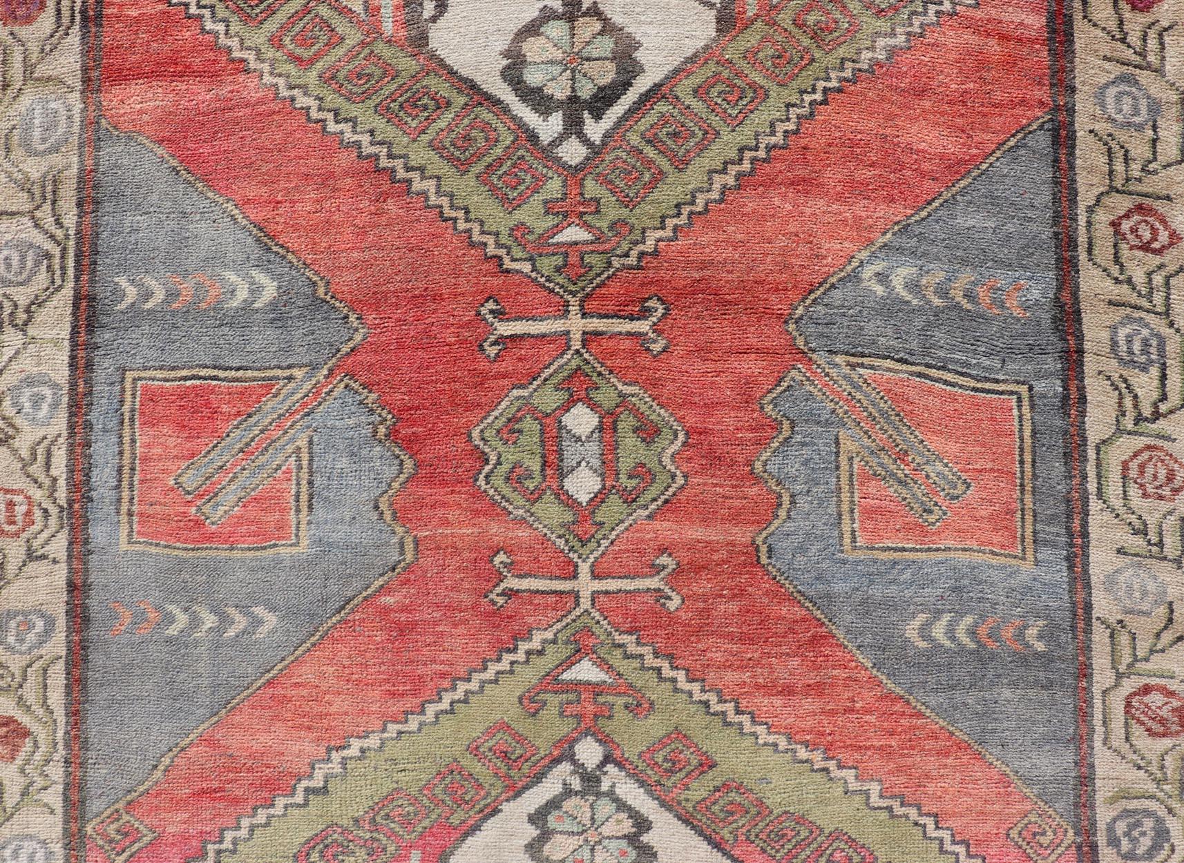 Wool Red Field Vintage Turkish Oushak Gallery Runner with A Geometric Design For Sale