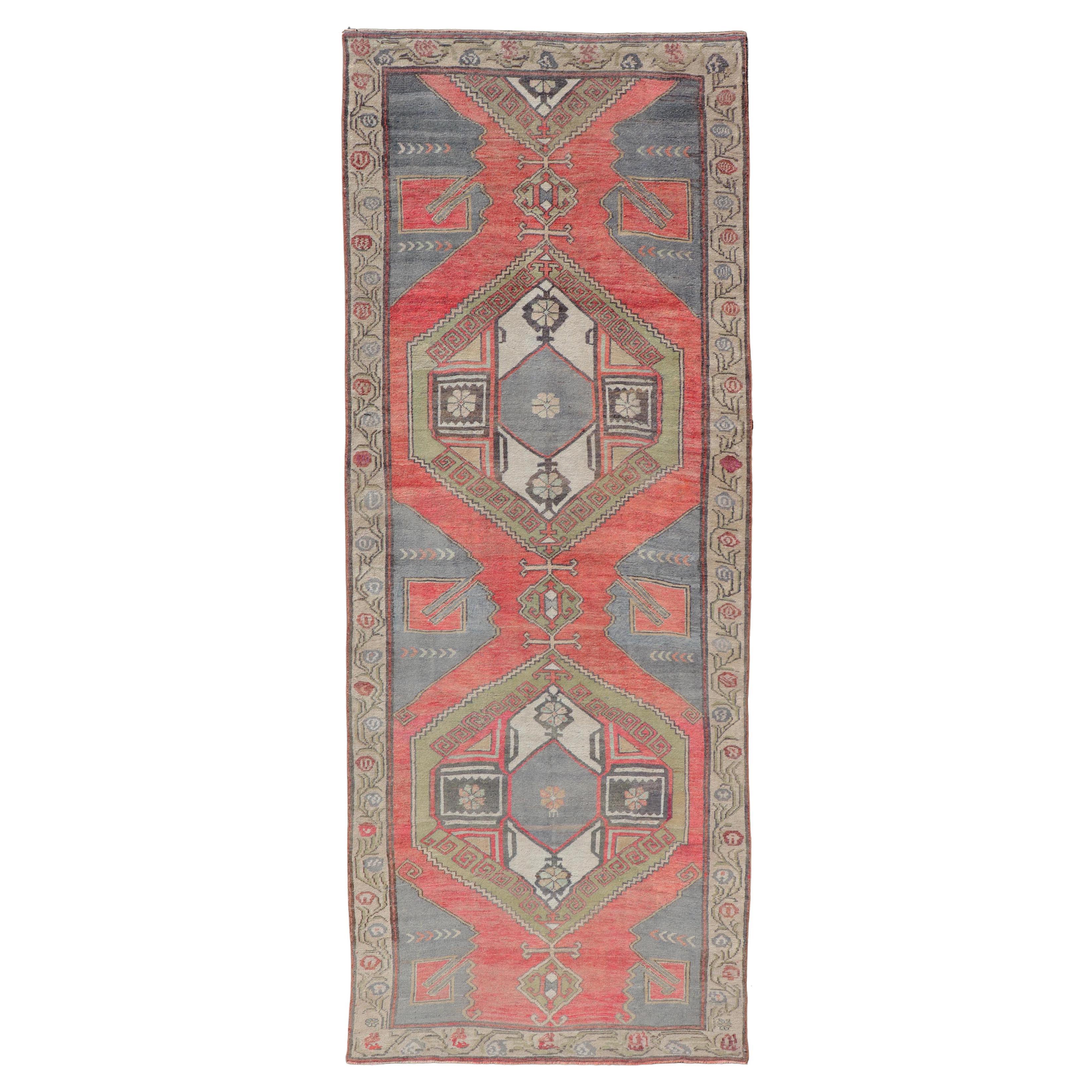 Red Field Vintage Turkish Oushak Gallery Runner with A Geometric Design For Sale