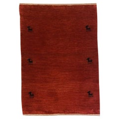Red Gabbeh Rug with Minimalist Tribal Design and Black Animal Motifs, 2' x 3'