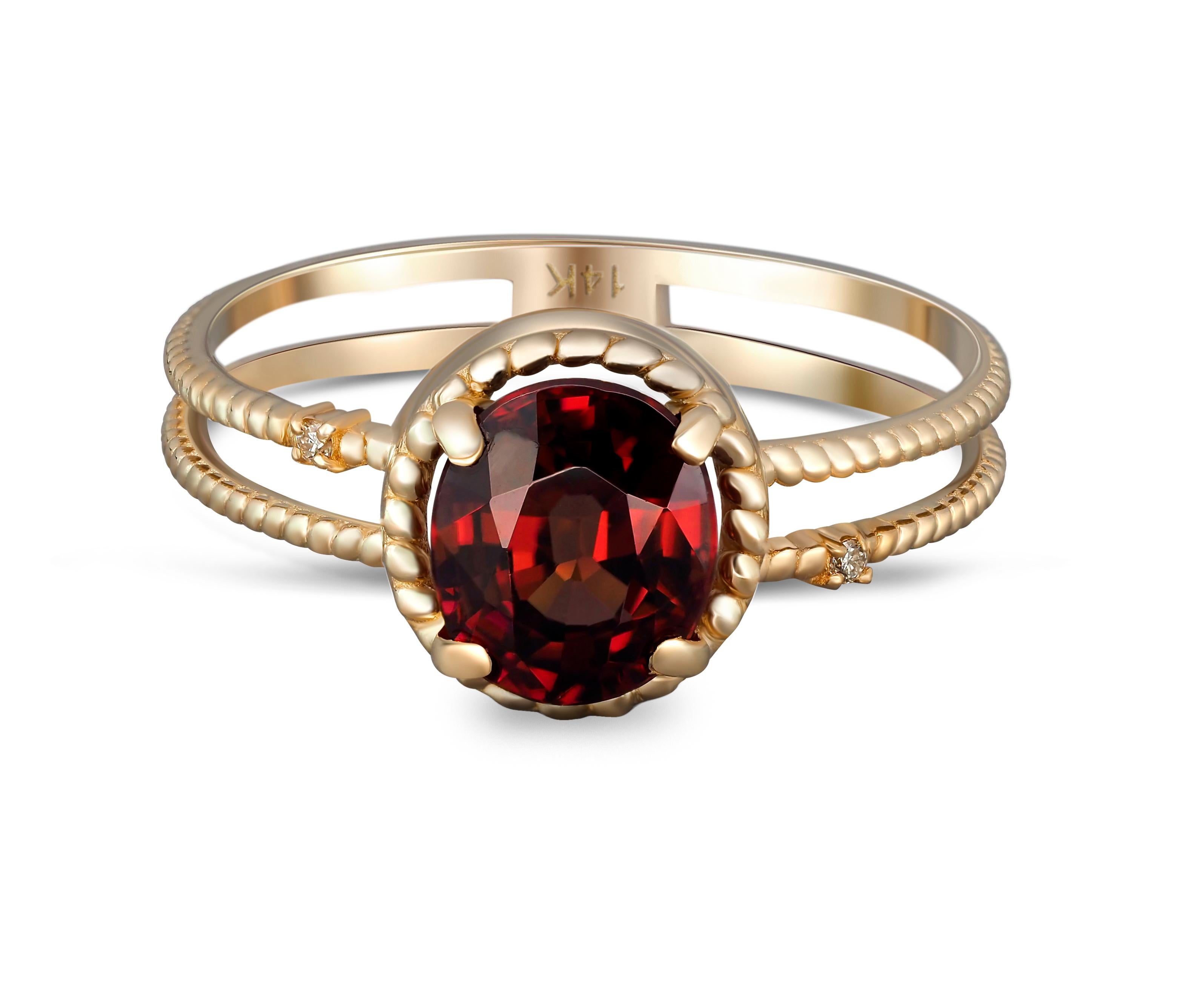 Oval Cut Red garnet gold ring.