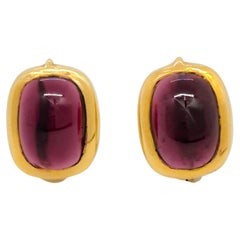 Ovale Ohrstecker aus rotem Granat aus 18 Karat Gelbgold