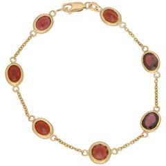 Red Garnet Spectacle Chain Bracelet Set in 9 Karat Yellow Gold