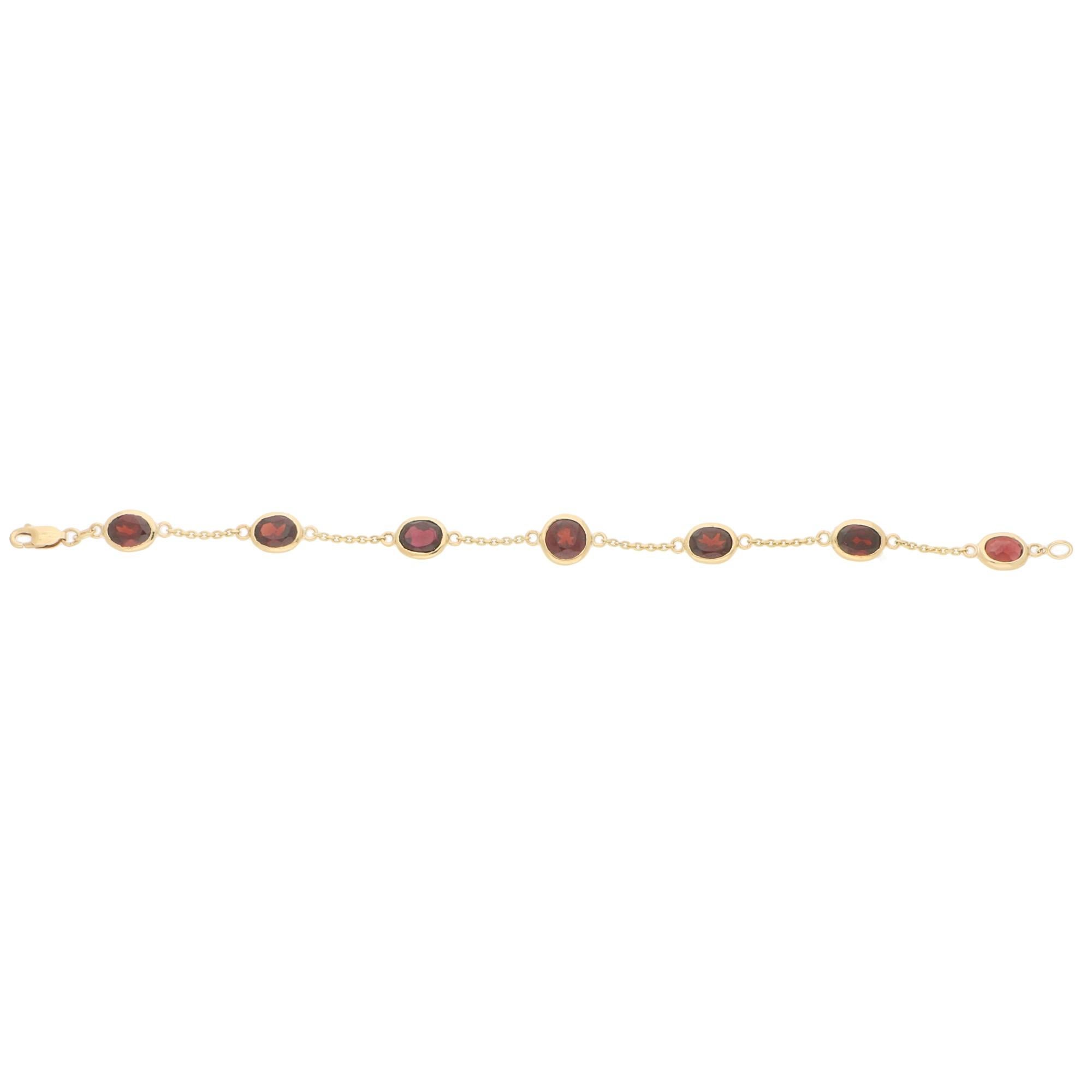 Modern Red Garnet Spectacle Chain Bracelet Set in 9 Karat Yellow Gold