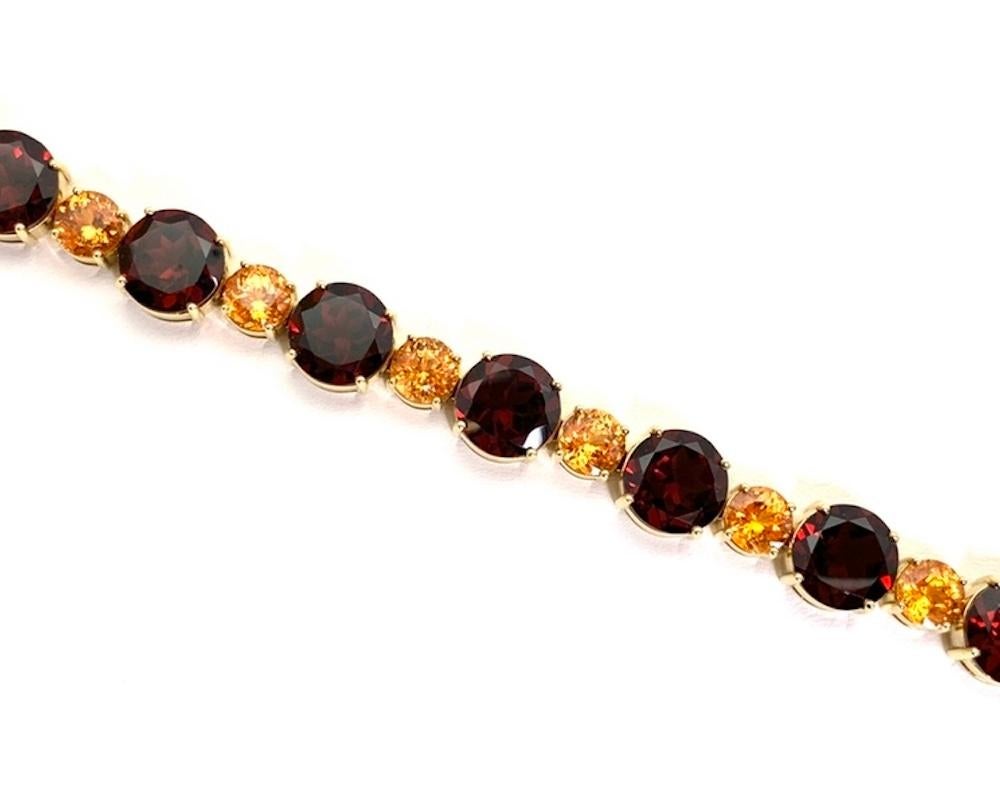 Tennisarmband aus Spessartin und rotem Granat, insgesamt 54,87 Karat in Gelbgold (Kunsthandwerker*in) im Angebot