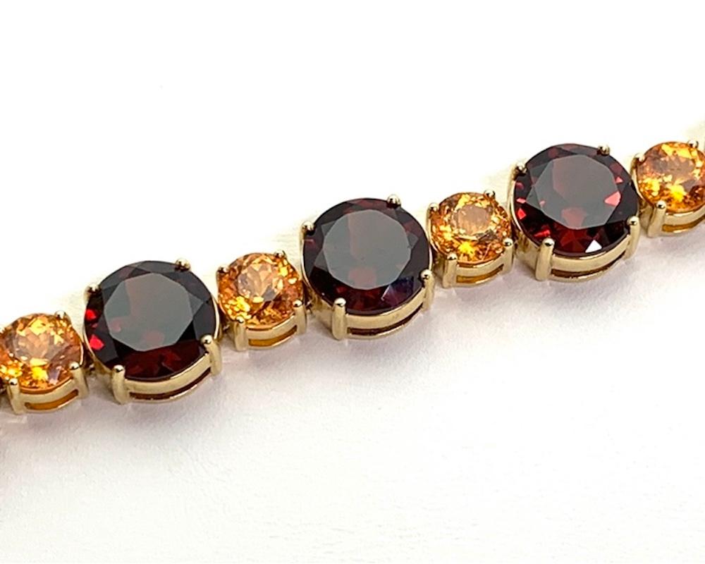 Spessartite and Red Garnet Tennis Bracelet, 54.87 Carats Total in Yellow Gold In New Condition For Sale In Los Angeles, CA