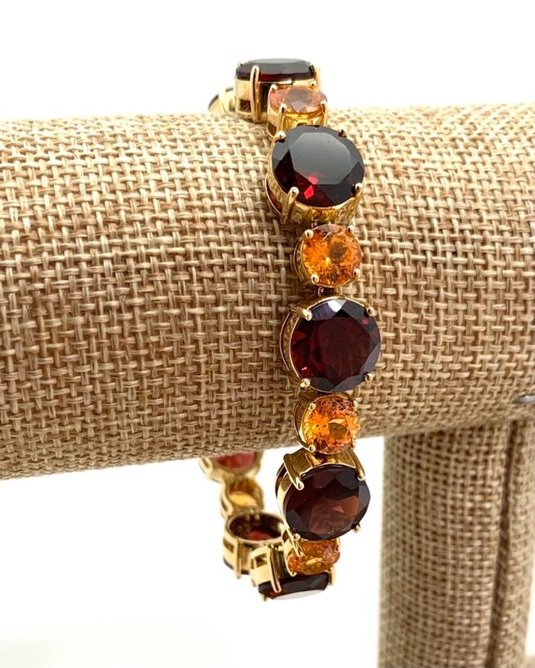 Spessartite and Red Garnet Tennis Bracelet, 54.87 Carats Total in Yellow Gold For Sale 1