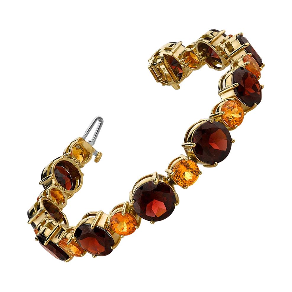 Spessartite and Red Garnet Tennis Bracelet, 54.87 Carats Total in Yellow Gold For Sale