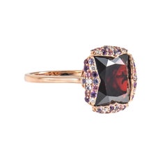 Sunita Nahata Garnet 13.32ct. Ring in 18KRG with Gemstones & White Diamond.