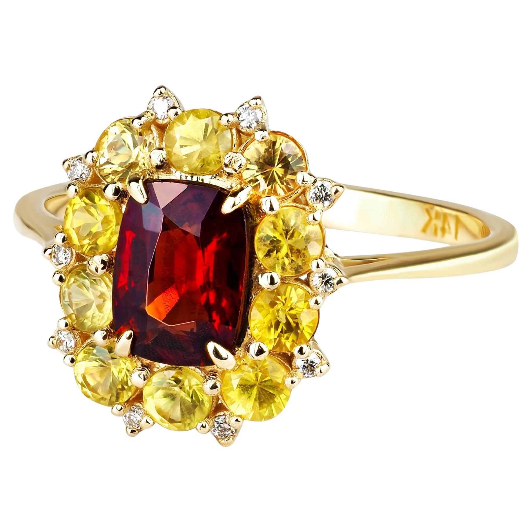 Red garnet, yellow sapphires gold ring. 