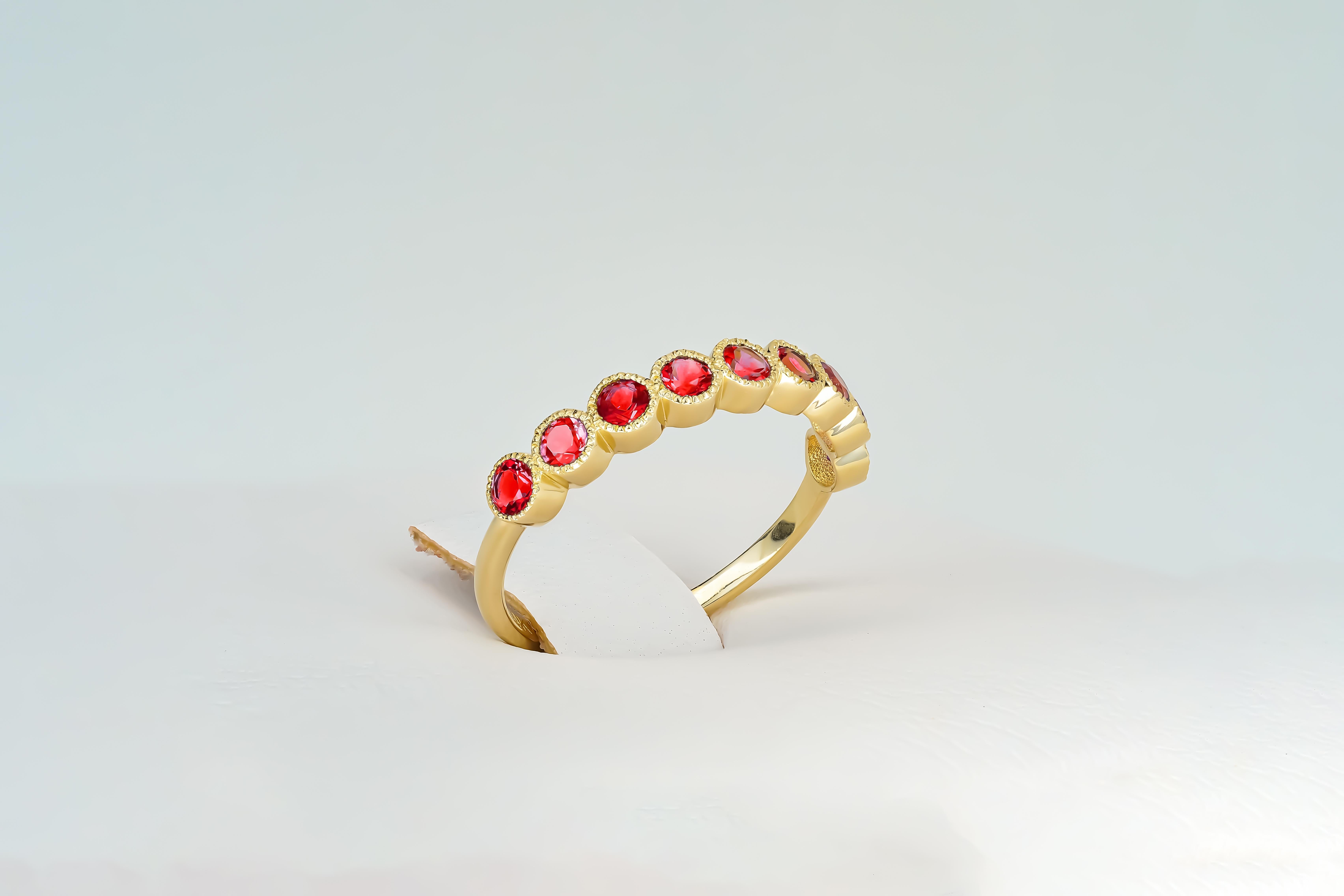 Red gem half eternity 14k gold ring.
Lab ruby semi eternity ring. Round red gemstone gold ring. 2.5 mm lab red ruby ring.

Metal: 14k gold
Weight: 1.8 gr depends from size

Gemstones:
Lab ruby, red color, round cut, 2.5 mm size. 

In our shop you