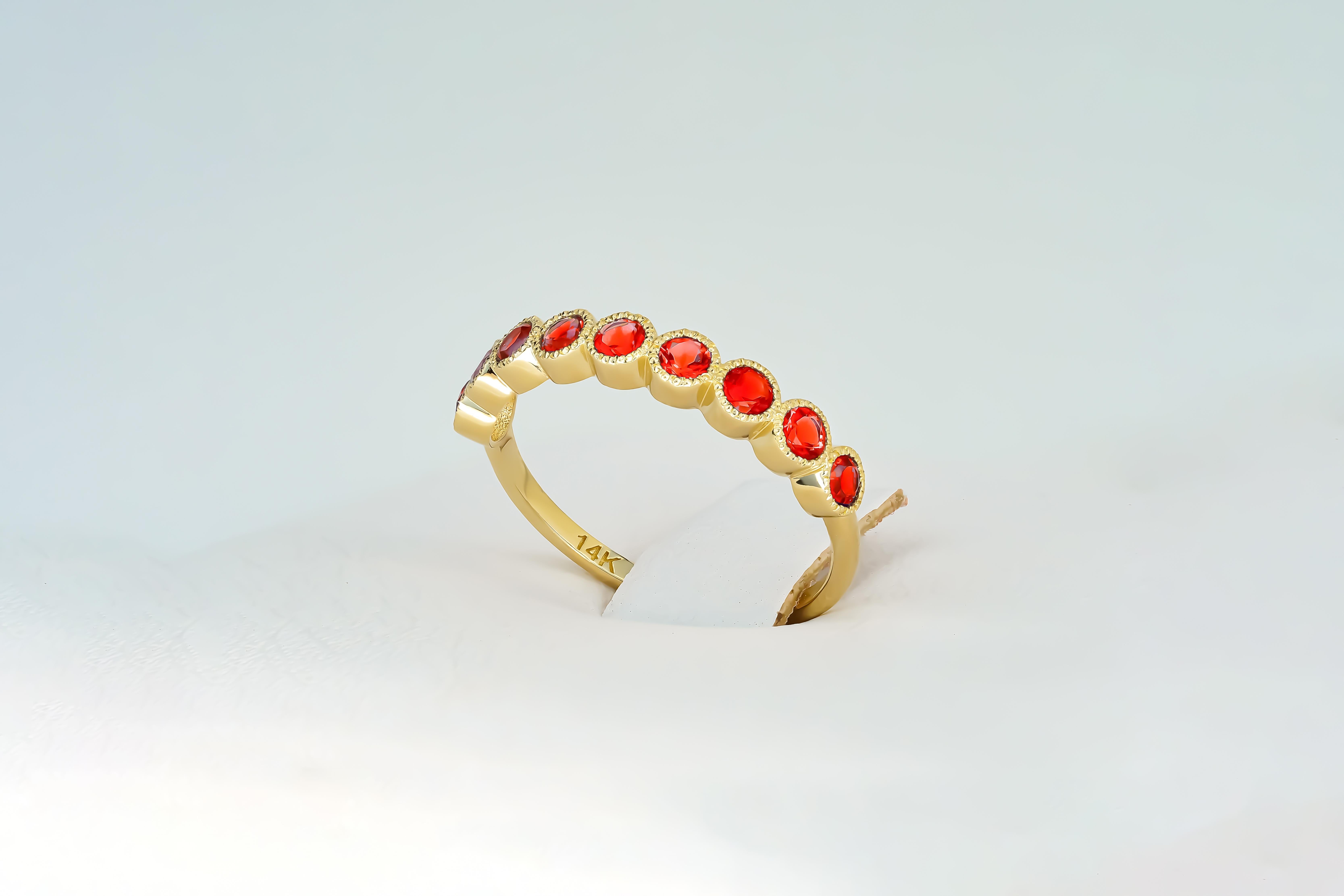 Modern Red gem half eternity 14k gold ring. For Sale