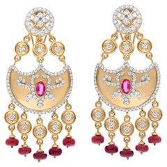Orecchini pendenti con gemma rossa SI/H Diamante rotondo in oro giallo 14 kt.
