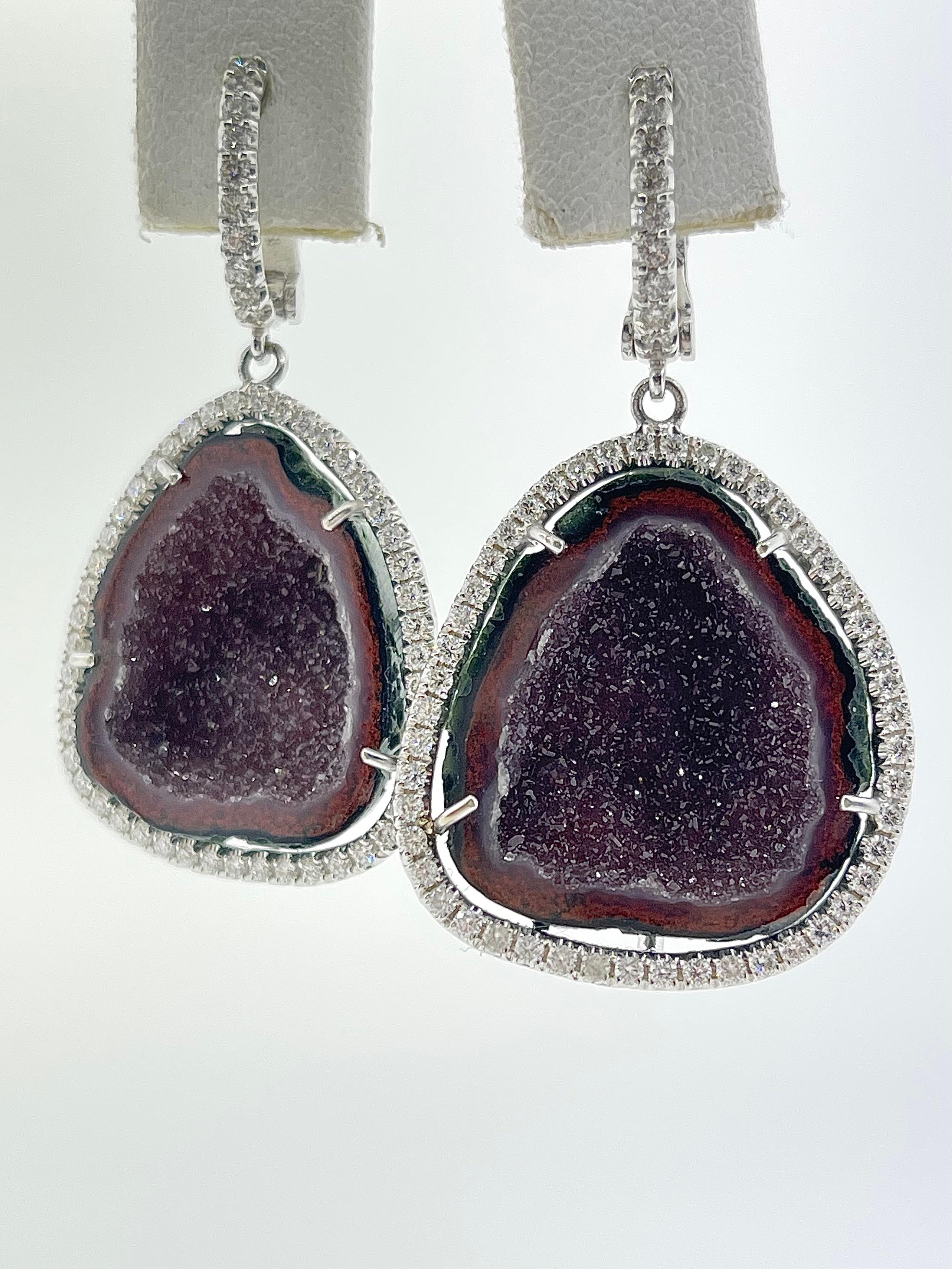 These beauties are a one of a kind piece ... a piece that is unique only to you! 

With a beautiful sparkle, these geodes are adorned by diamond halos and diamonds also on the hook! 

Don't miss out on owning this unique piece ! 
