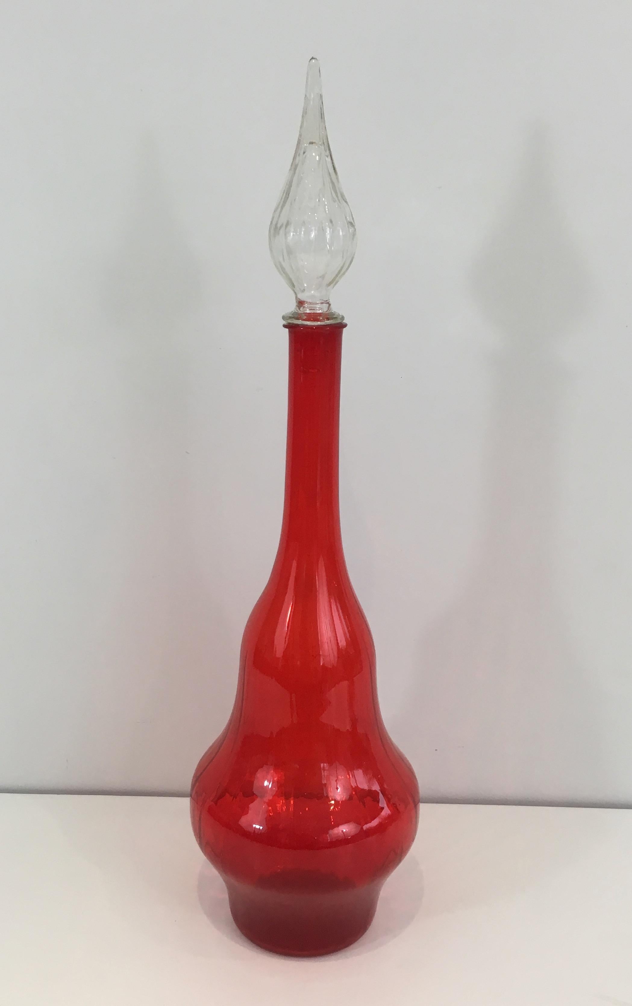 Red glass design bottle. Circa 1970.