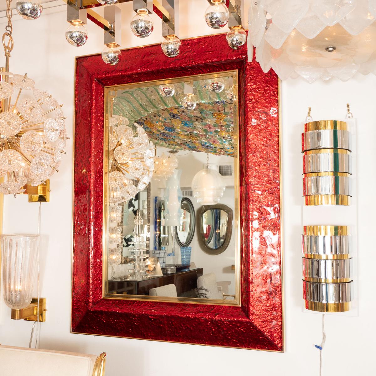 Rectangular brass and red glass surround mirror. Color can be customized.