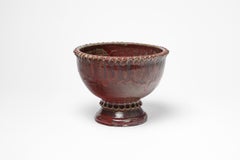 Red glazed ceramic footed bowl by Jean Maubrou, circa 1940-1950