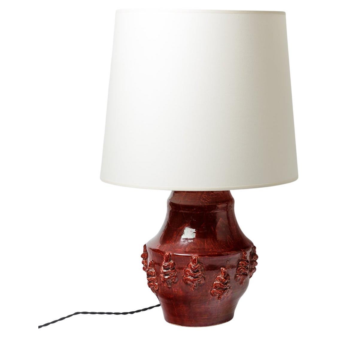 Red glazed ceramic lamp by Jean Austruy, circa 1960-1970