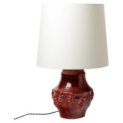 Red glazed ceramic lamp by Jean Austruy, circa 1960-1970