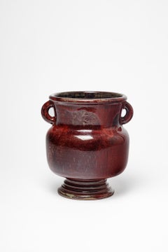 Red glazed ceramic vase by Jean Maubrou, circa 1940-1950