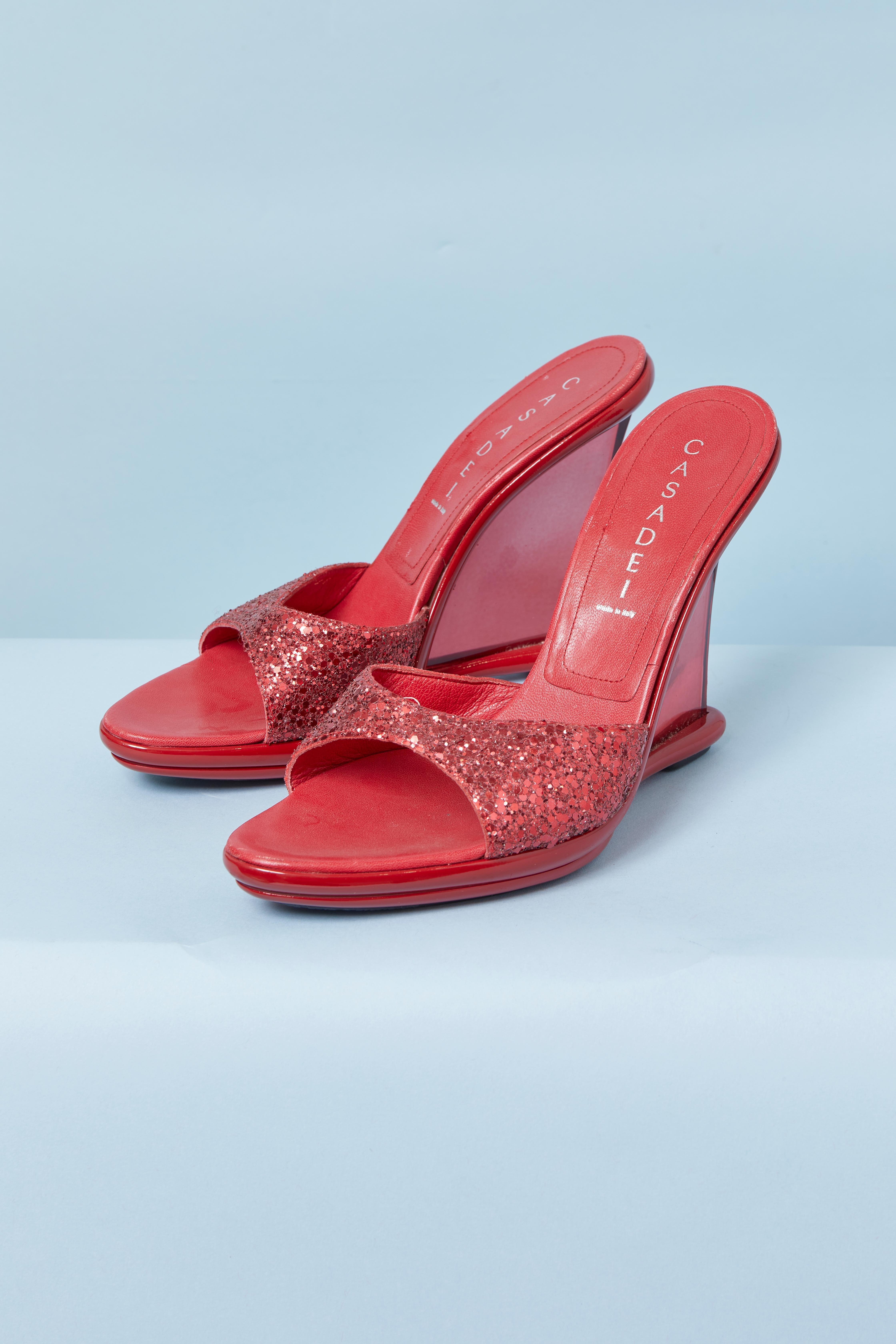 Mules rojos de purpurina y piel con tacón rojo de plexiglás transparente CASADEI Rojo en venta