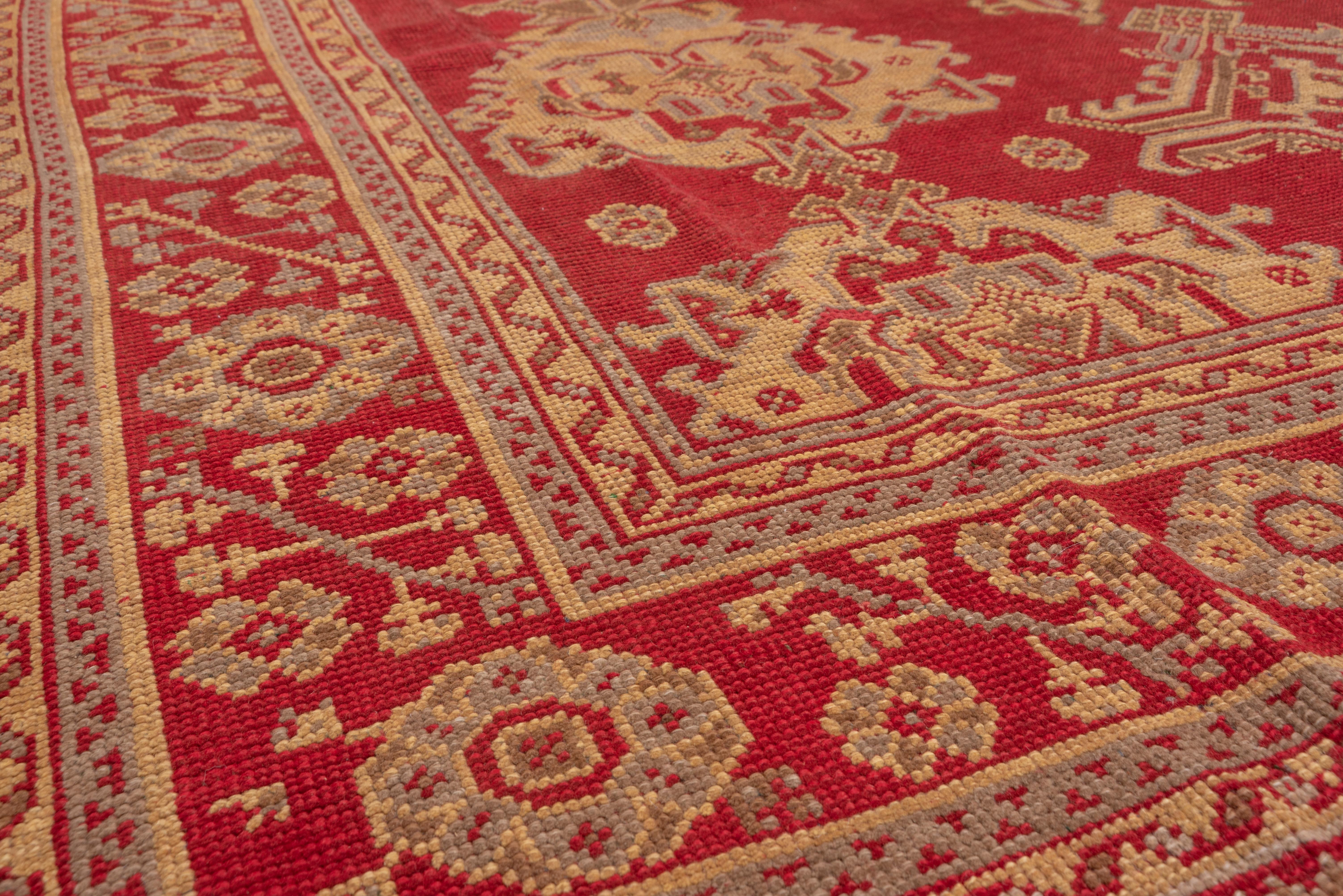 Hand-Knotted Red & Gold Antique Turkish Oushak Rug with an Allover Field, circa 1920s For Sale