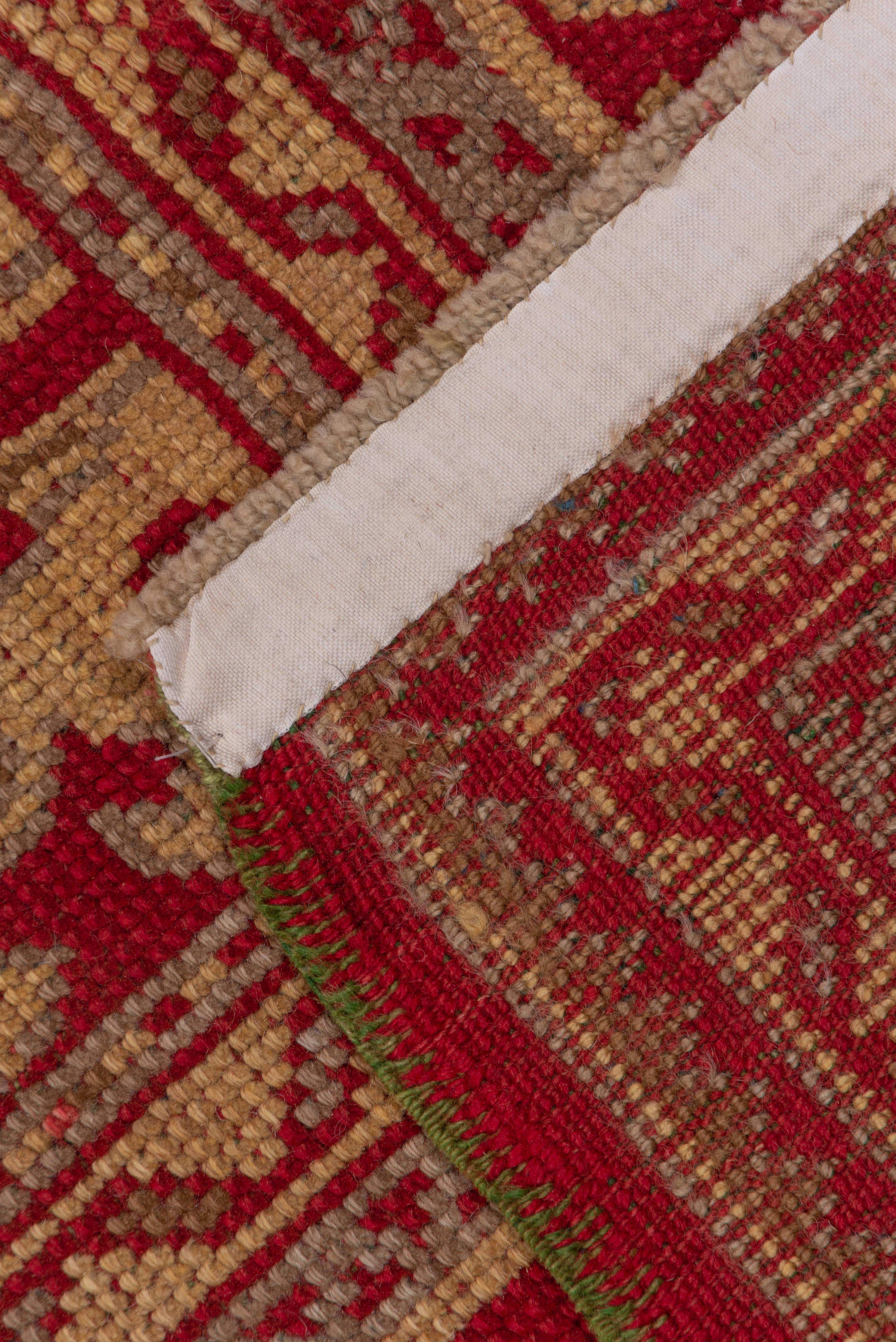 Laine Tapis turc ancien Oushak rouge et or avec un terrain allover, vers les années 1920 en vente