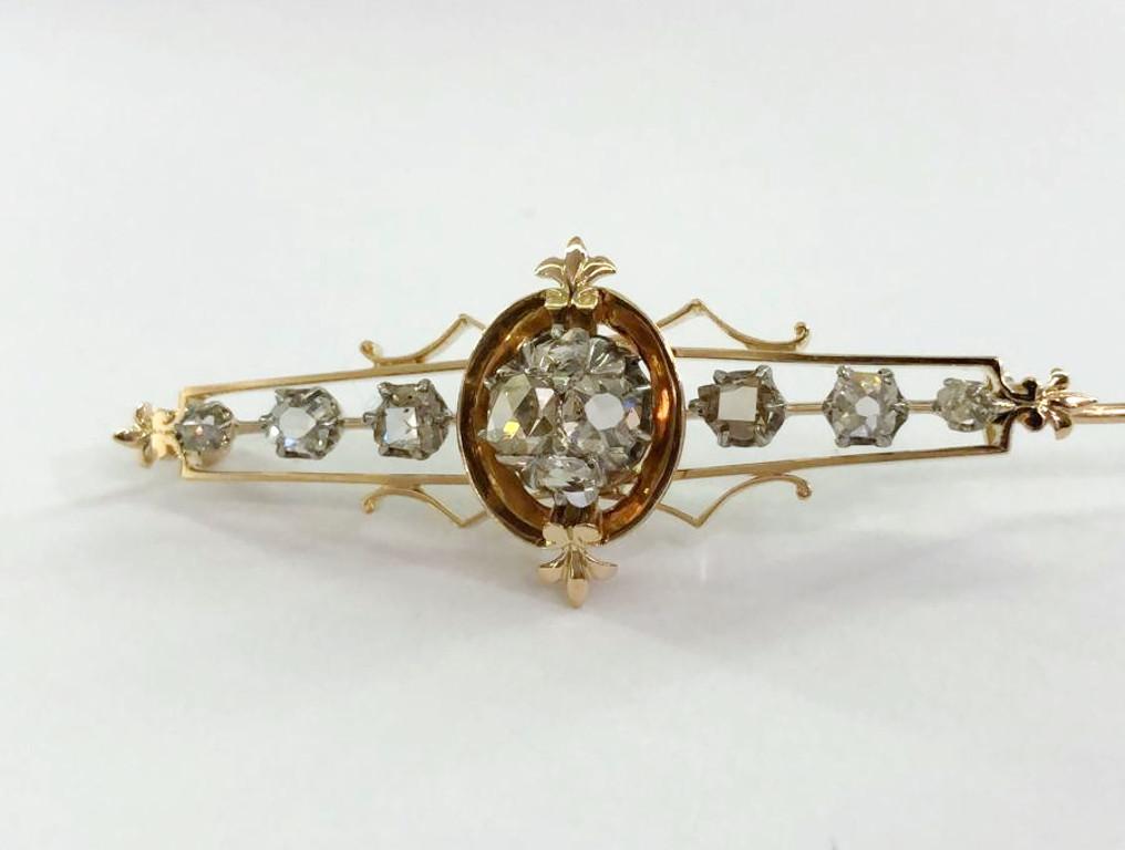 Vintage 14 karat red gold brooch with diamonds, Italy late 1800s 
Length 8.5 cm
Width 1.5 cm