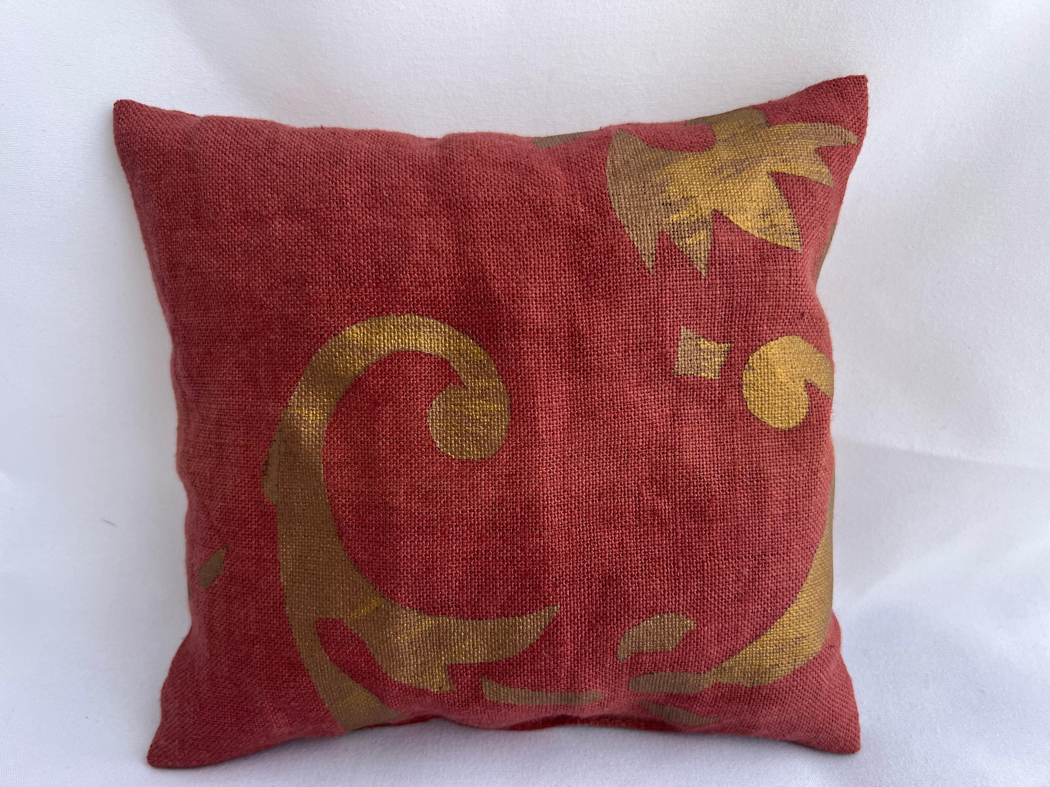 Nomi linen pillow in red & gold print,  filled with lavender.  These make great host gifts or any gift.  You can buy three and tie them together with a great ribbon and you are good.