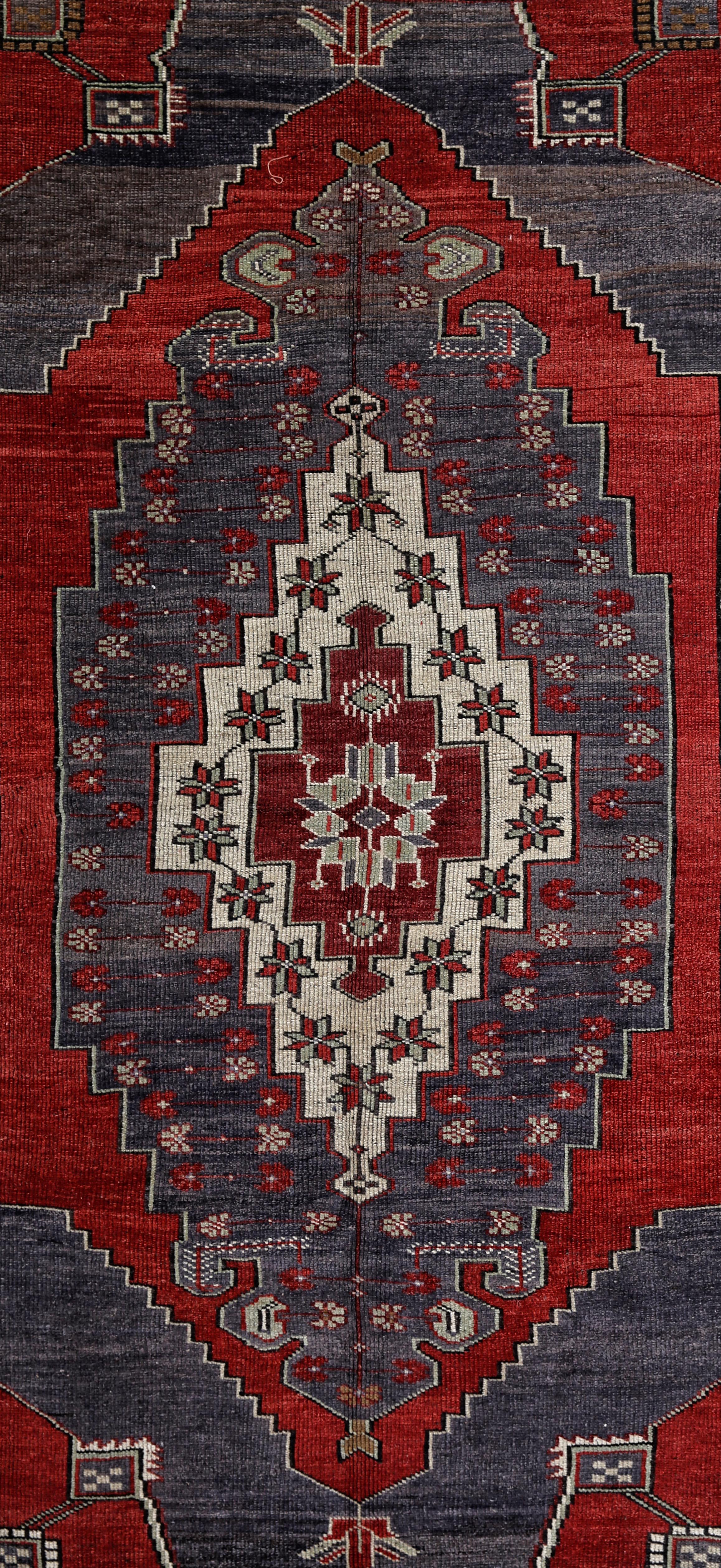 Anatolian rugs are hand knotted in the Central Anatolia or Asia Minor region of Turkey. The patterns are from Ottoman era as well as modern Turkey. The central medallion used in this rug symbolizes the central authority of the Ottoman Sultans. In