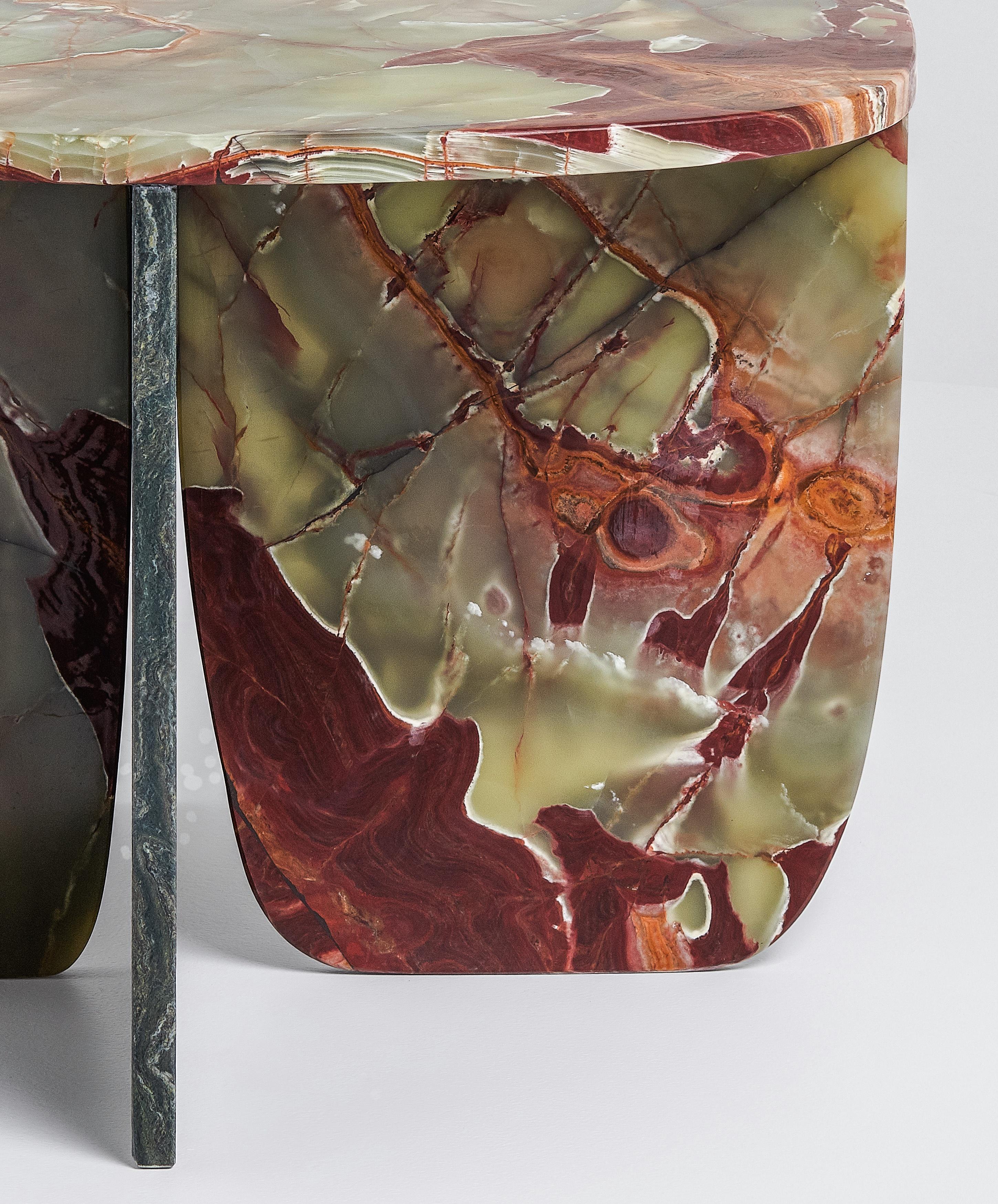 Red green onyx coffee table by Oskar Peet and Sophie Mensen
Dimensions: 55 x 47 x 40 cm
Materials: onyx and verde smaragd

Studio OS ? OOS is design studio for small objects to larger spatial concepts;
the studio tries to find the balance