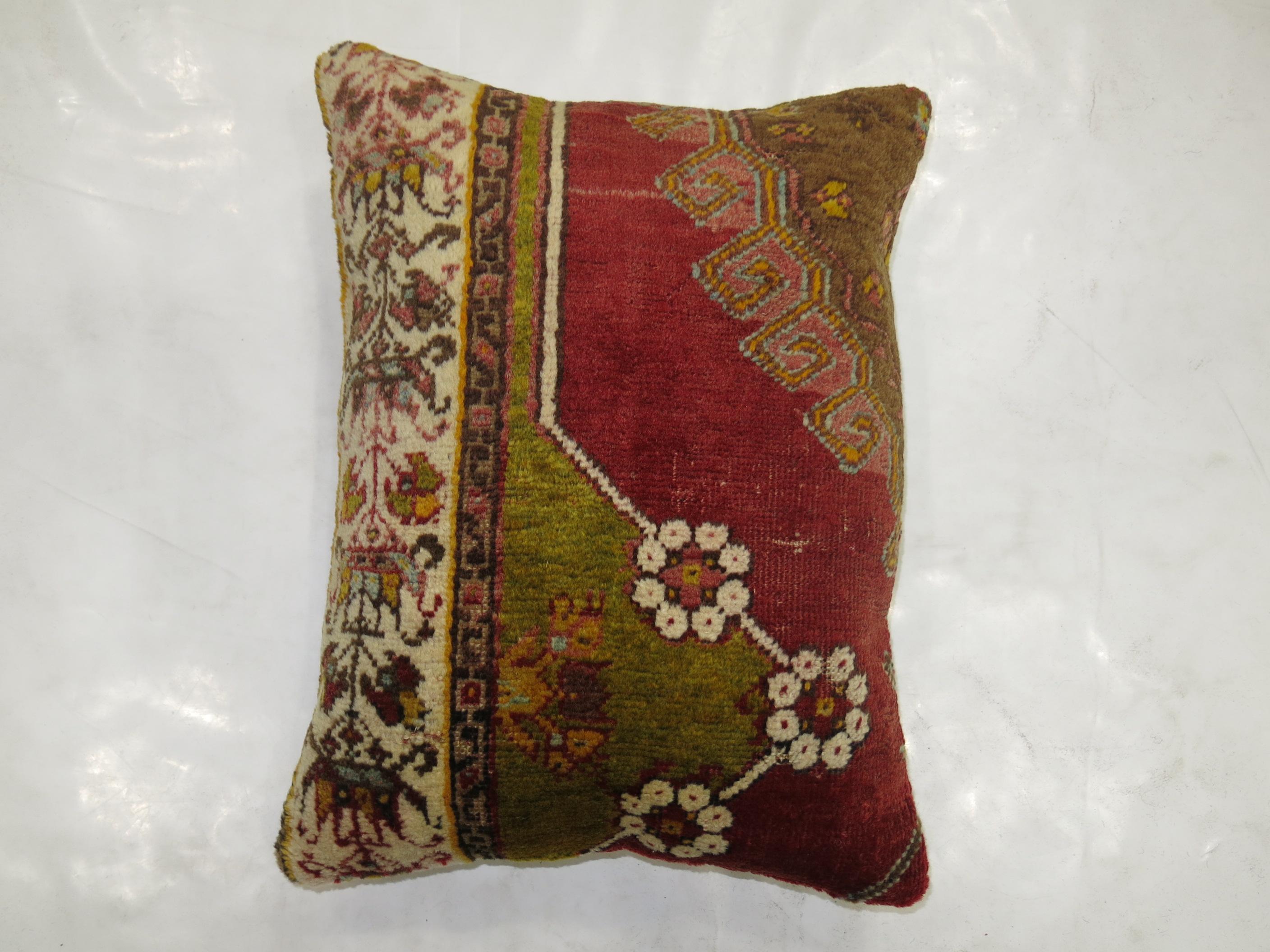 Pillow made from an antique Turkish rug from the early 20th century.

Measures: 15