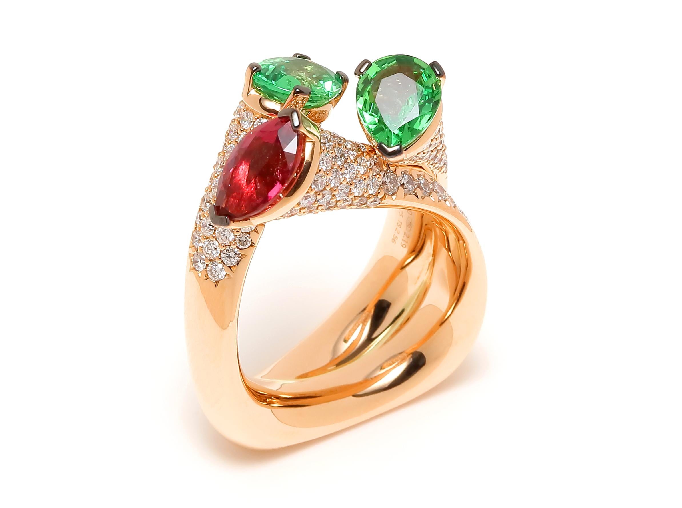 Red & Green Twist Layers Ring

Diamond Green Tsavorite Rubellite Pink Tourmaline Cocktail 18 Karat Gold Ring 

The winning swing and the architectural purity are the relevant ingredients for these rings of contemporary inspiration. Not only a matter