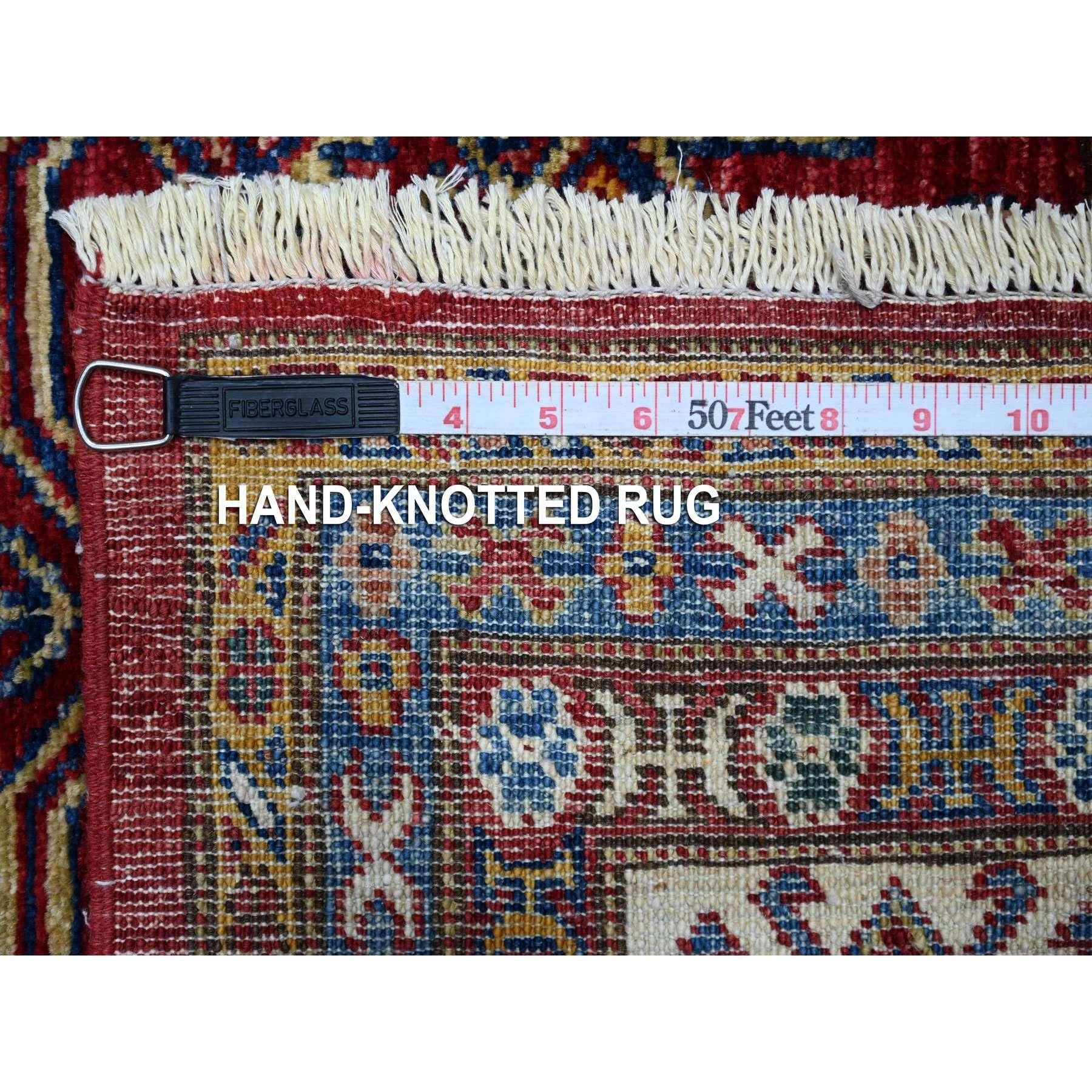 Tapis d'Orient rouge noué à la main avec de superbes motifs en laine pure 8'1