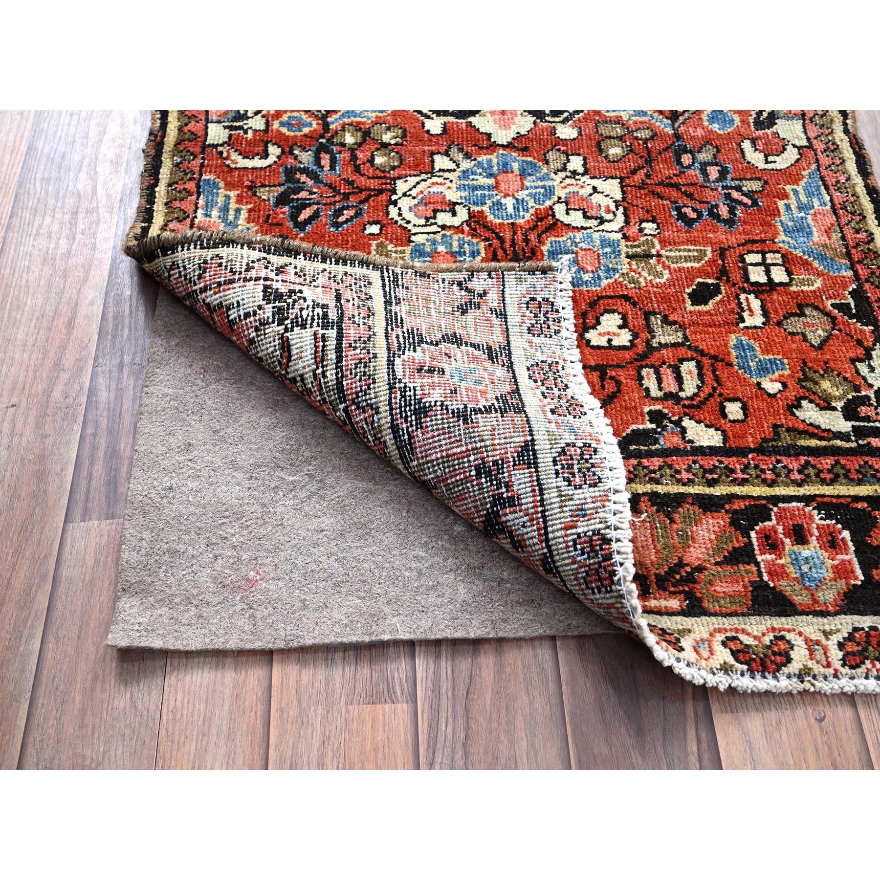 Medieval Red Hand Knotted Vintage Persian Lilahan Distressed Look Wool Narrow Runner Rug For Sale