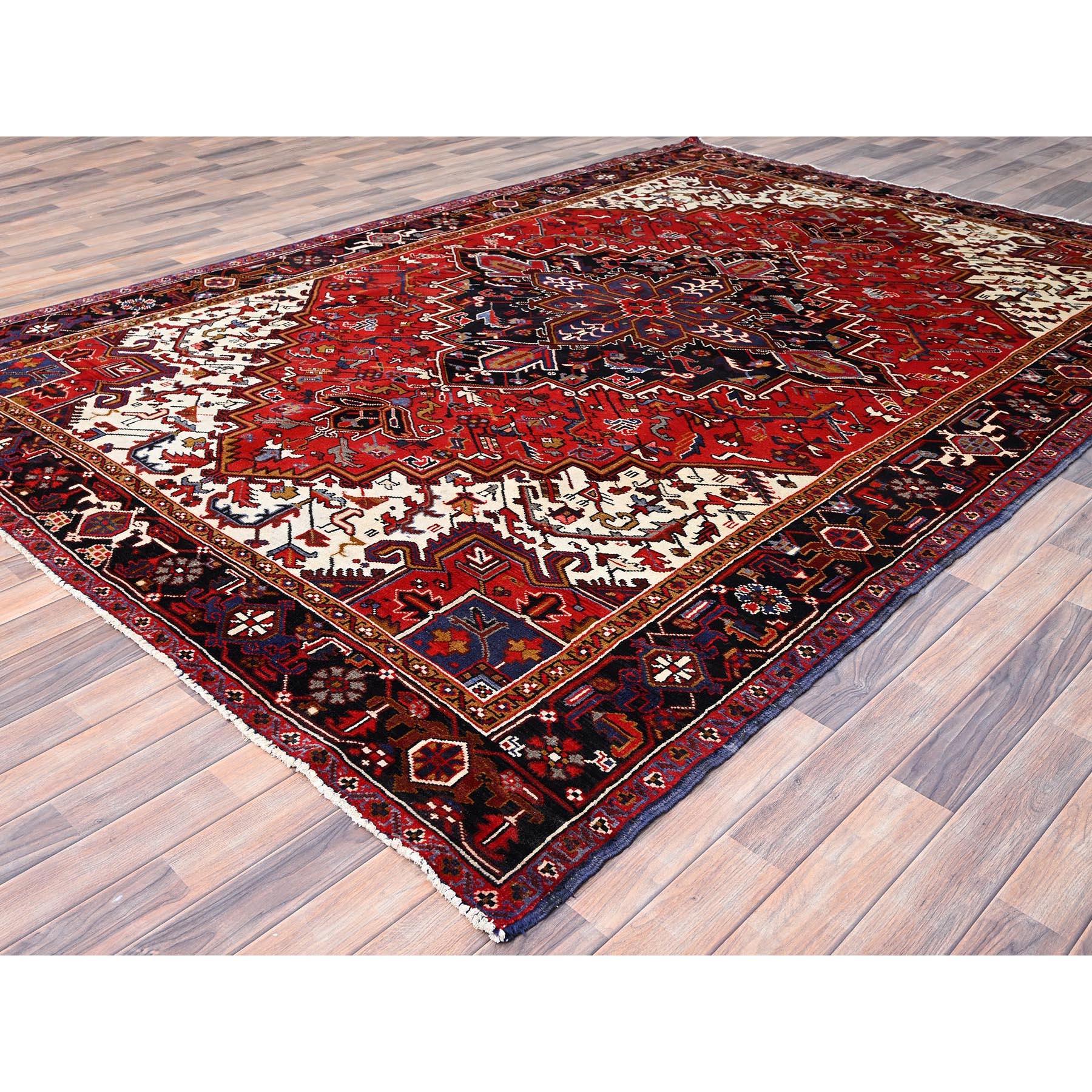 Hand-Knotted Red Hand Knotted Worn Down Vintage Wool Persian Heriz with Tribal Ambience Rug For Sale