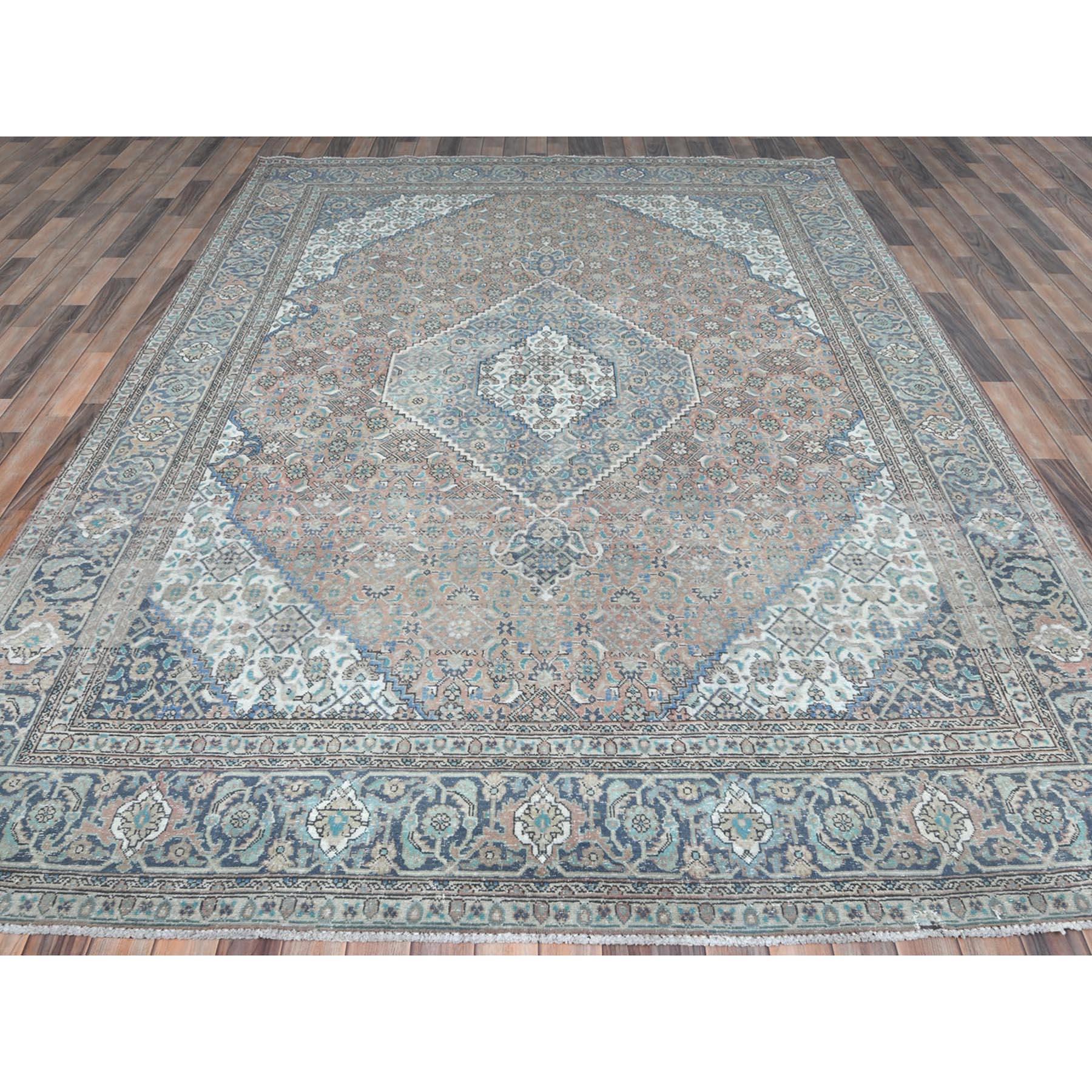 Hand-Knotted Red Hand Knotted Worn Wool Vintage Persian Tabriz Distressed Look Rug For Sale