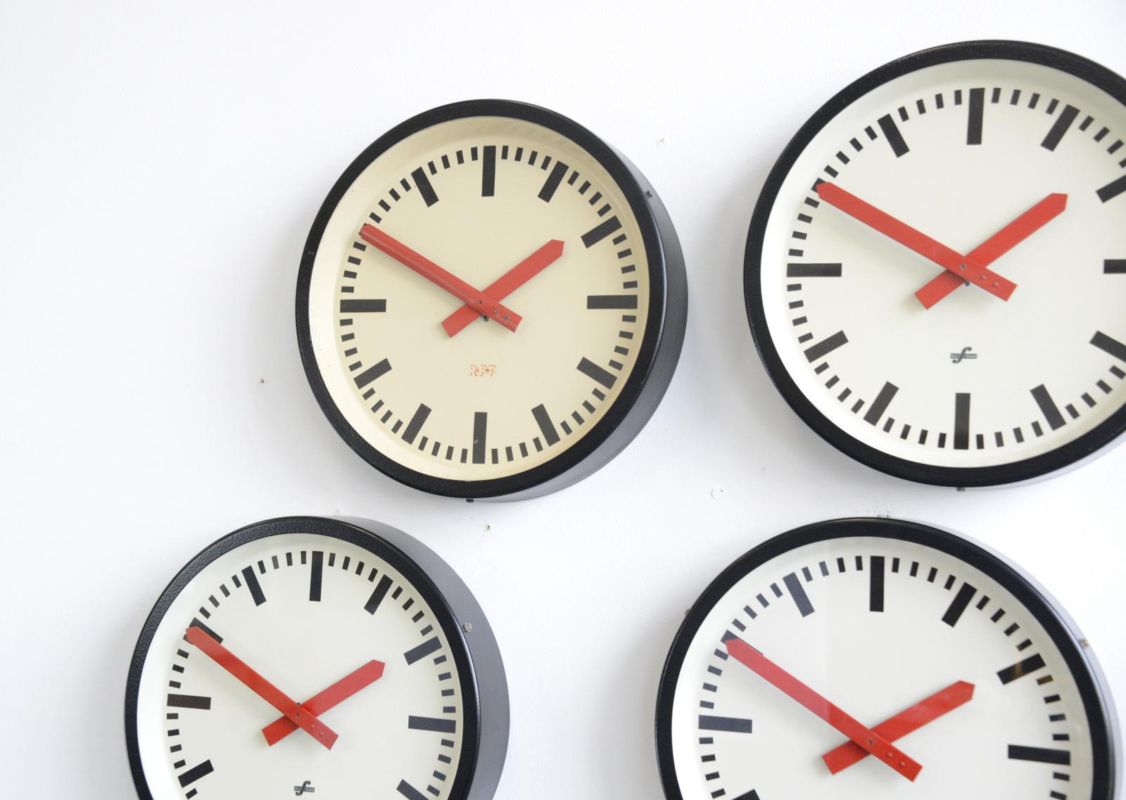 Mid-20th Century Red Handed Textile Factory Clocks, circa 1950s