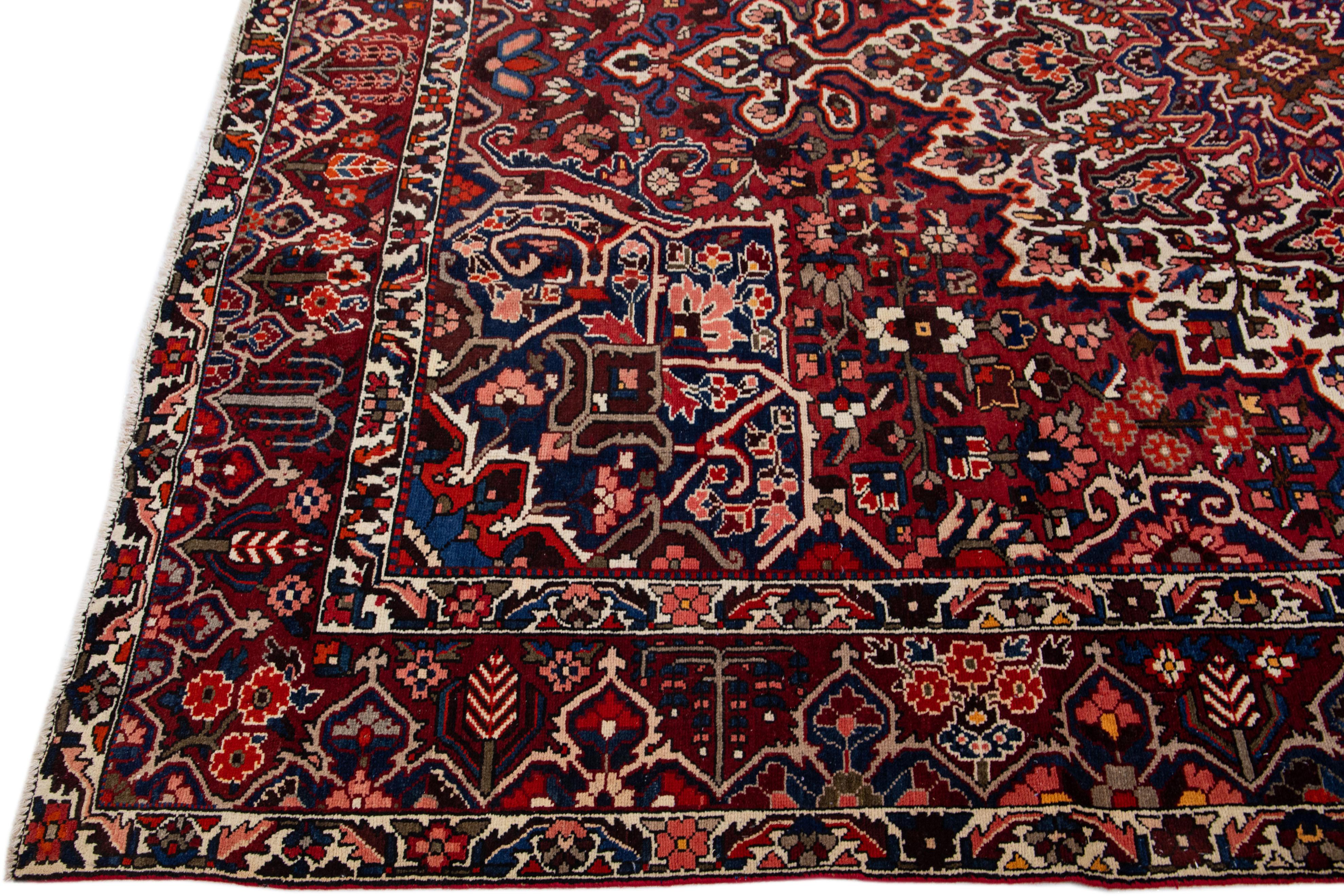 Hand-Knotted Red Handmade Antique Bakhtiari Persian Wool Rug with Medallion Motif For Sale