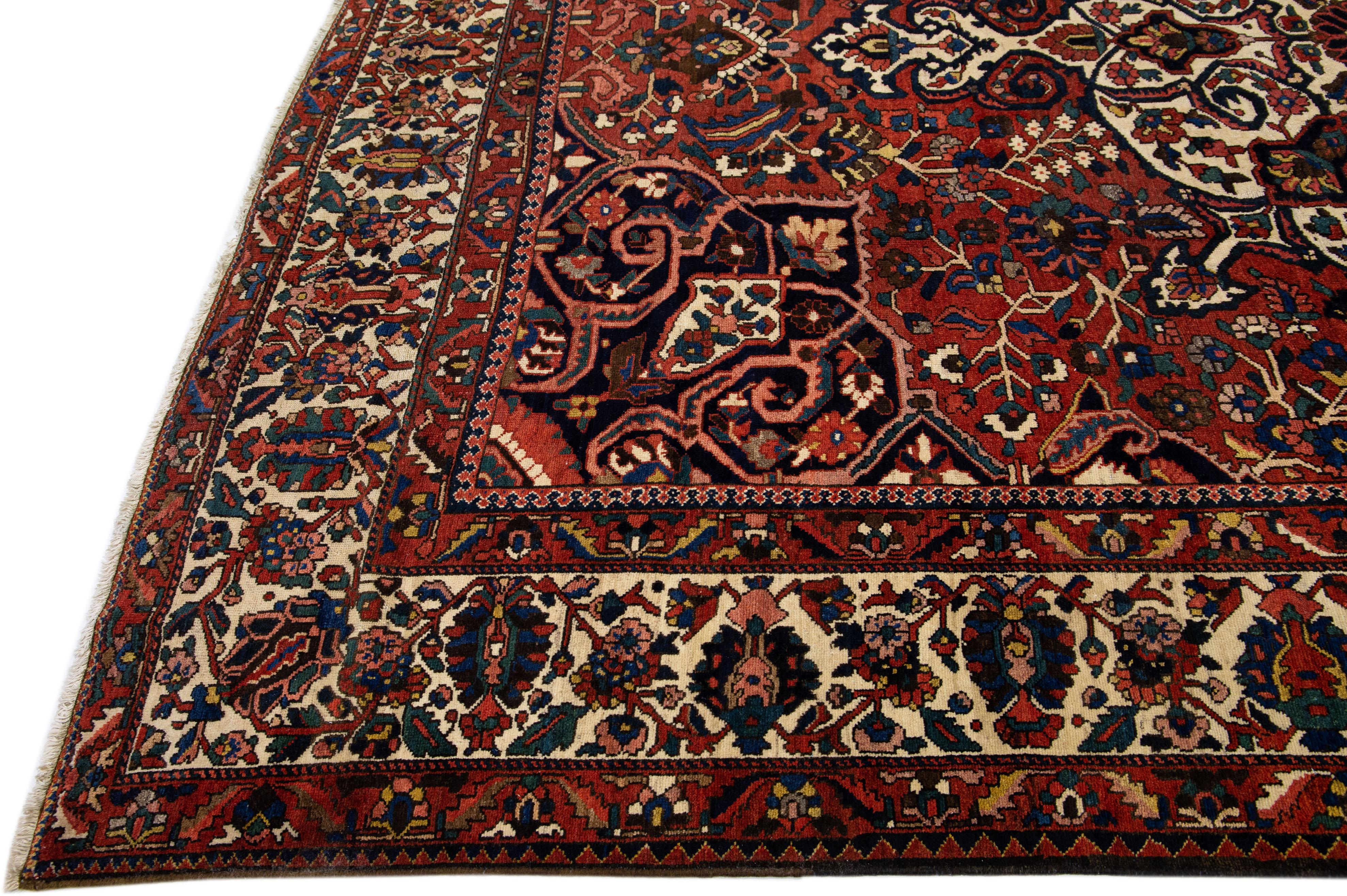 Islamic Red Handmade Antique Persian Bakhtiari Rosette Wool Rug  For Sale