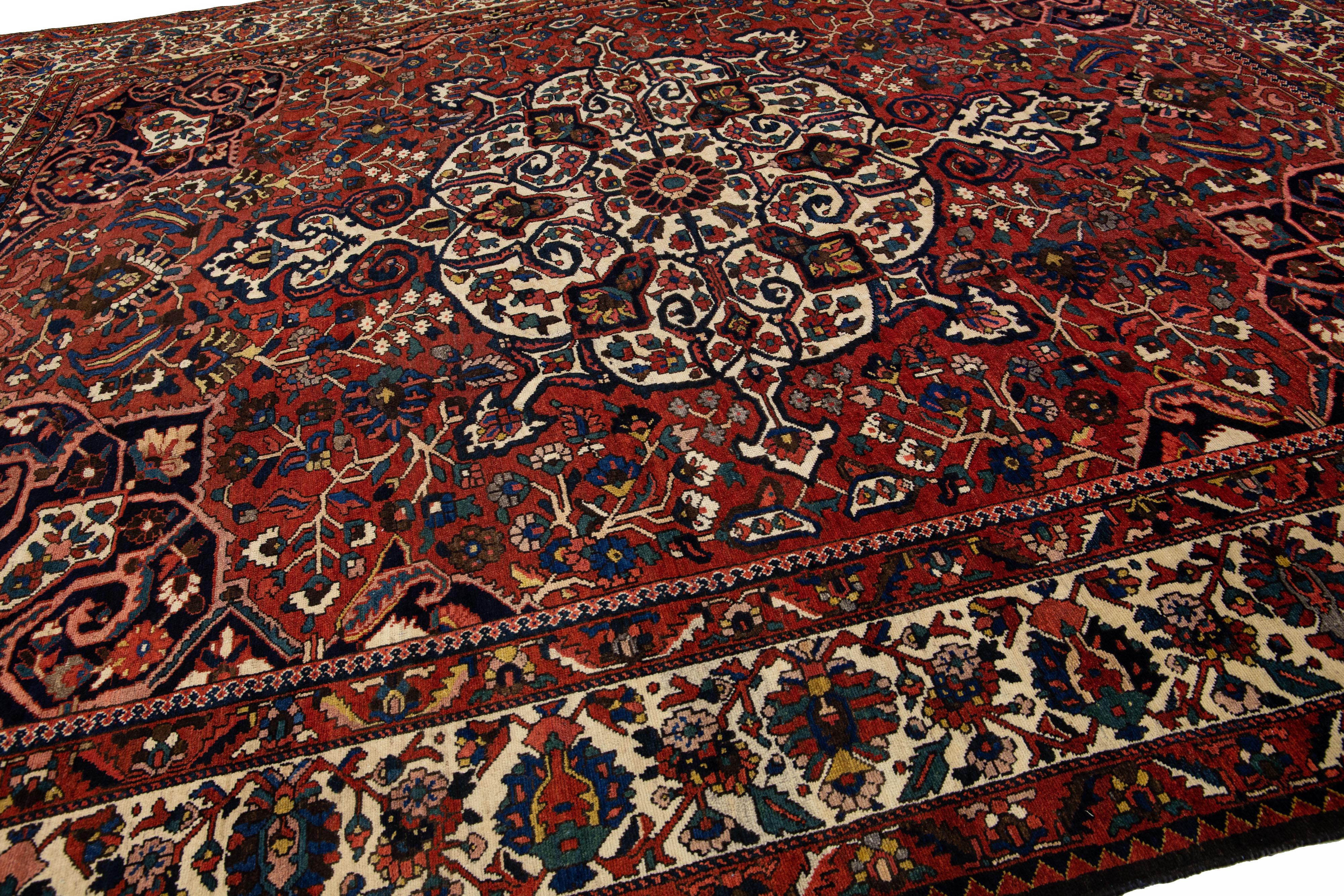 Hand-Knotted Red Handmade Antique Persian Bakhtiari Rosette Wool Rug  For Sale